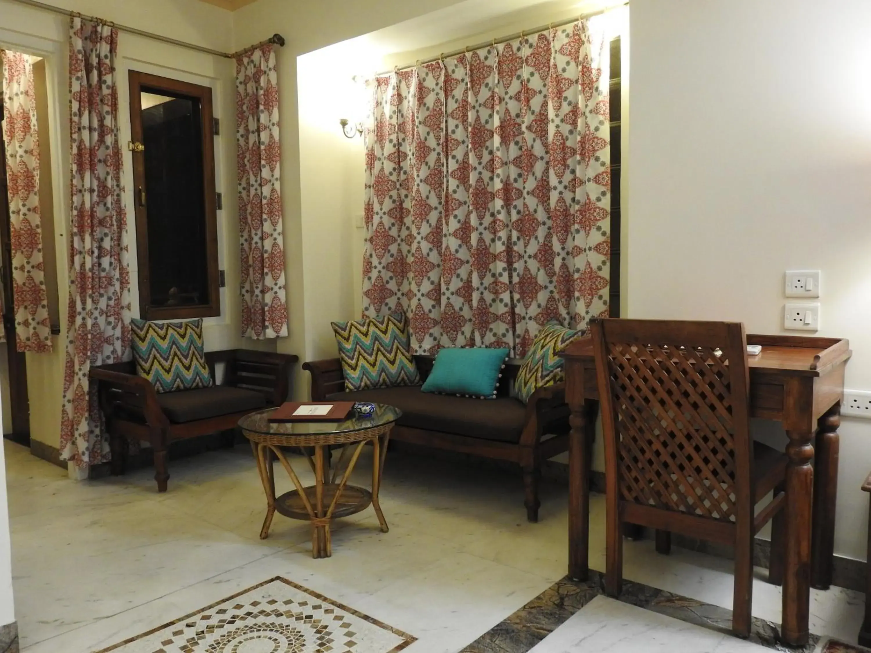 Bedroom, Seating Area in Om Niwas Suite Hotel