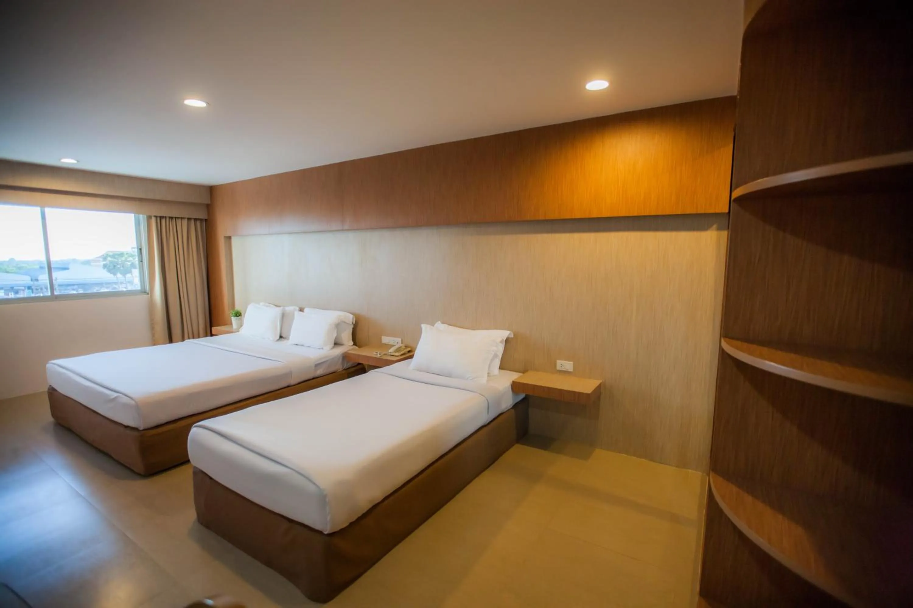 Photo of the whole room, Bed in Golden City Rayong Hotel