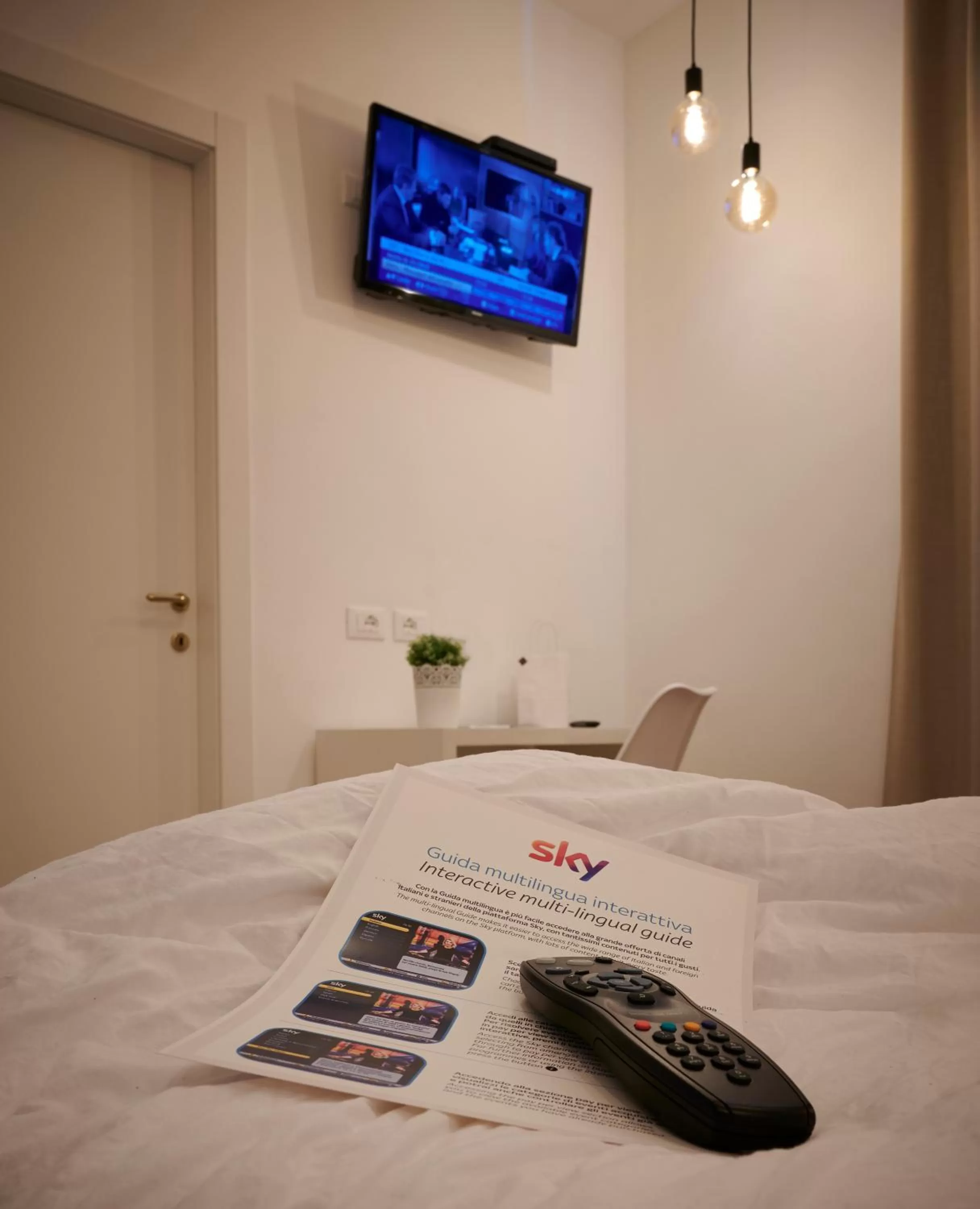 TV and multimedia, Bed in Lainez Rooms & Suites
