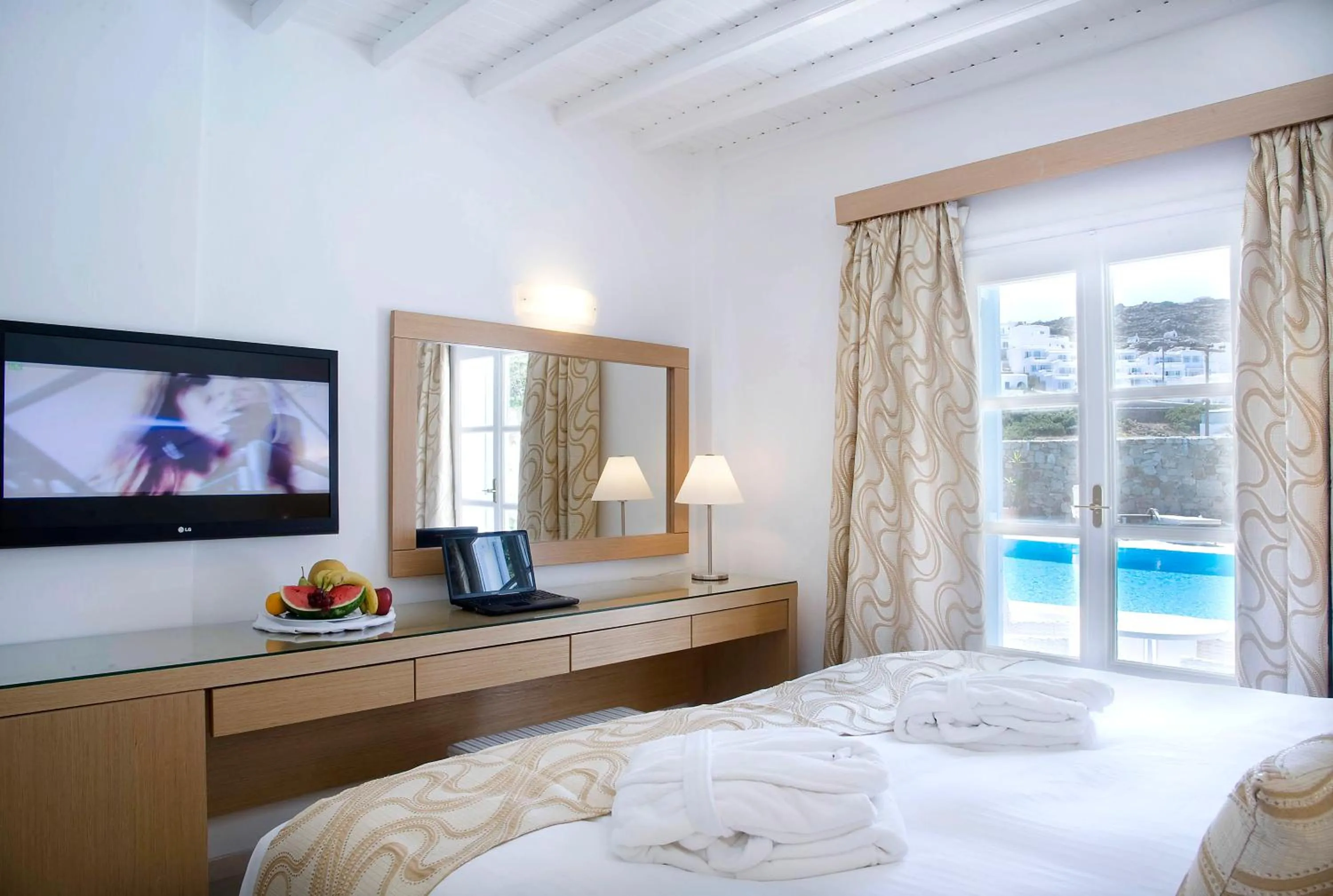 TV and multimedia, Bed in Dionysos Luxury Hotel Mykonos