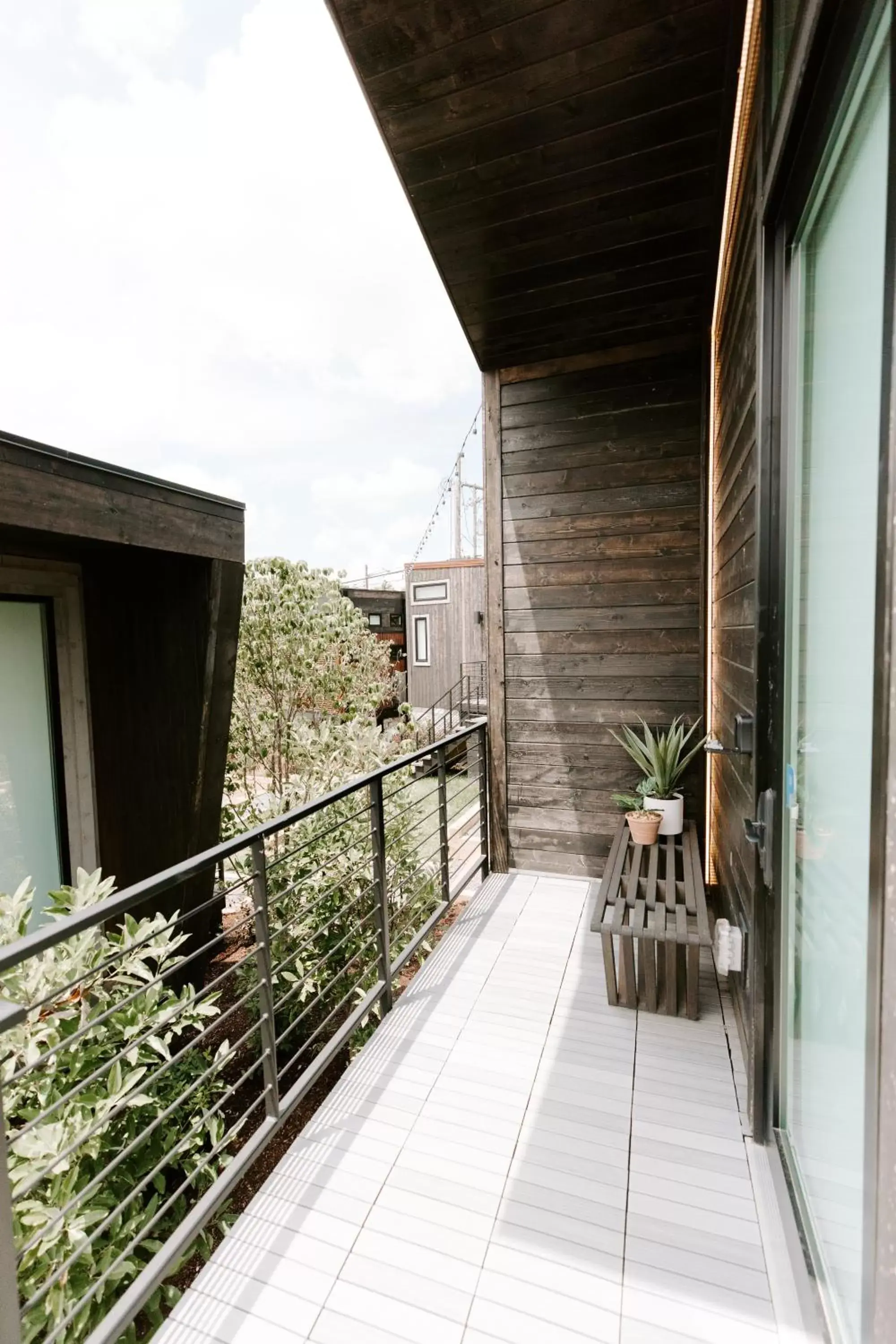 Facade/entrance, Balcony/Terrace in Ironwood Grove, Tiny House Hotel