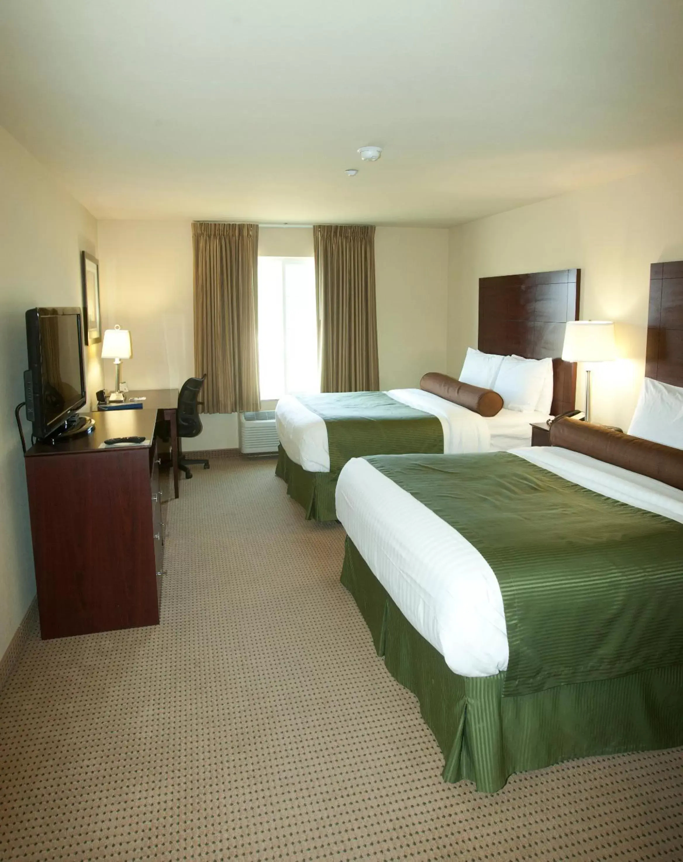 Bedroom, Bed in Cobblestone Inn & Suites - Langdon