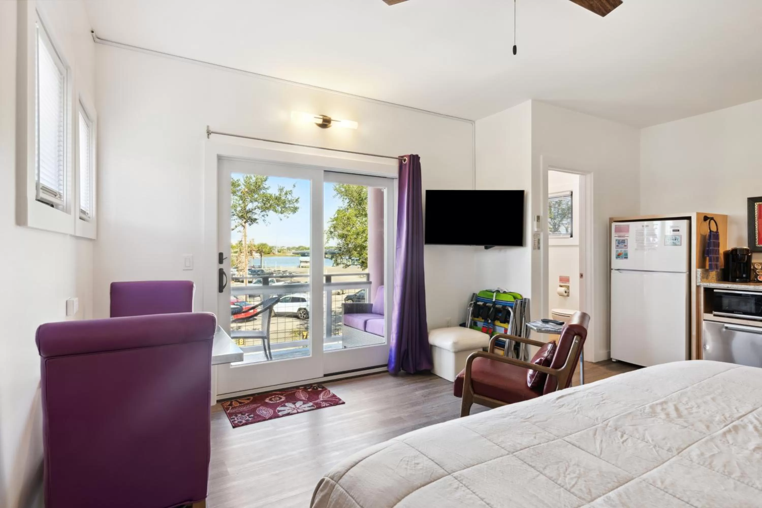 Bed in Hotel Folly with Marsh and Sunset Views