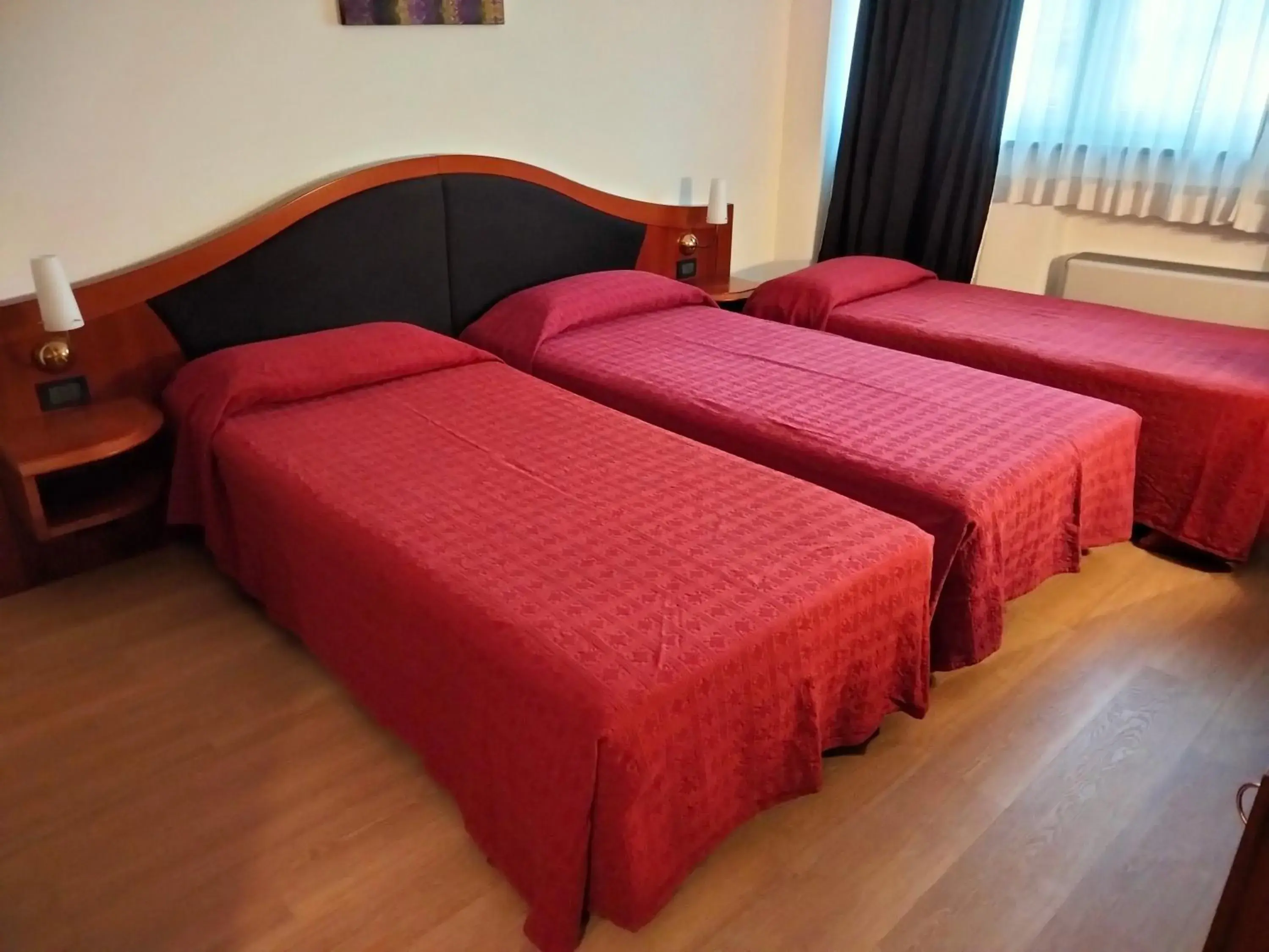 Bed in Hotel Donizetti