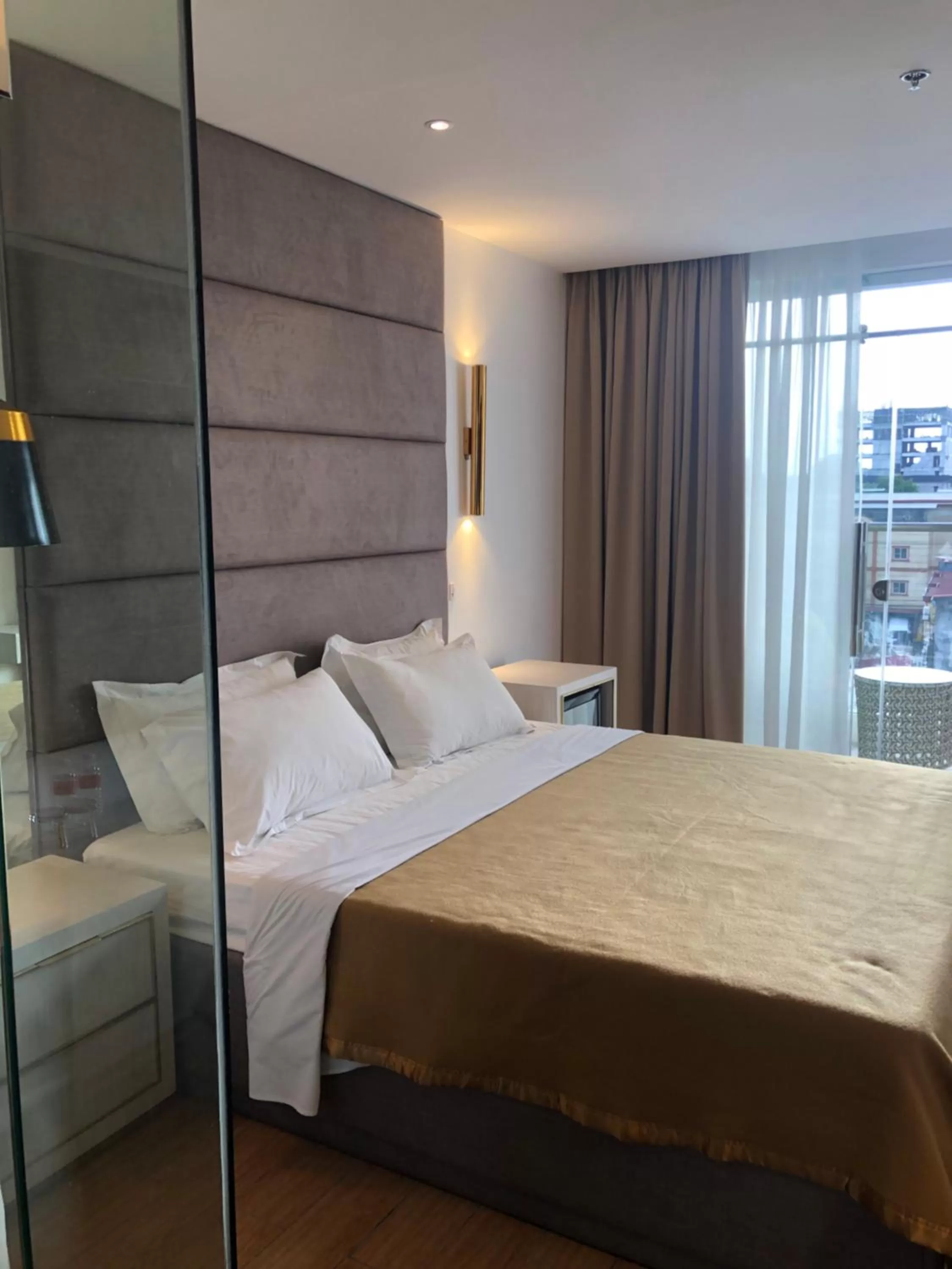 Bed in Apollonia Royale Hotel