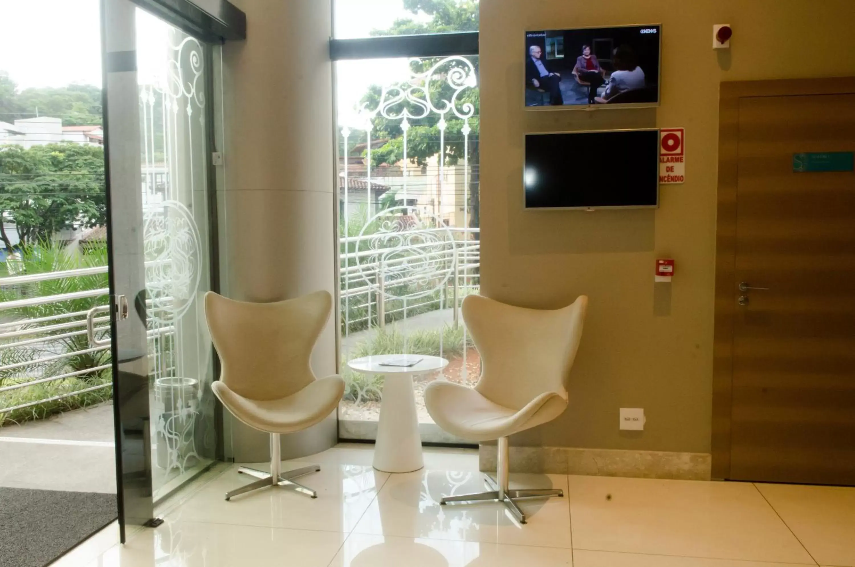 Lobby or reception, TV/Entertainment Center in Ville Celestine Condo Hotel e Eventos