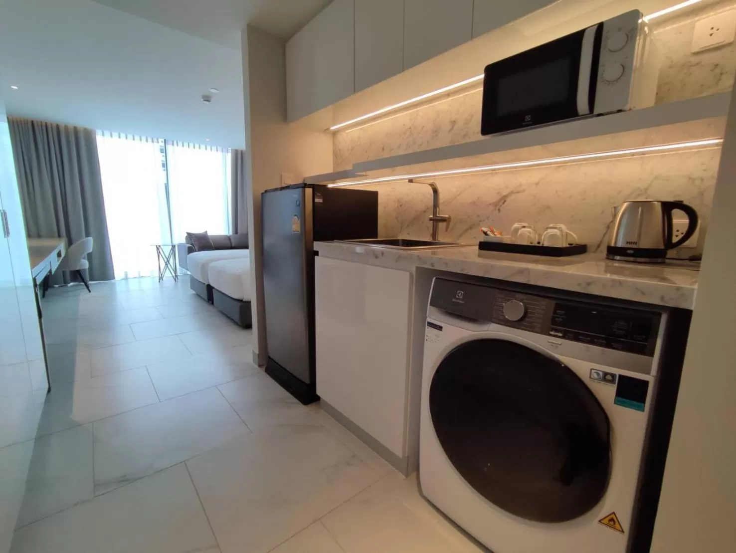 Communal kitchen in ashley hotel bkk