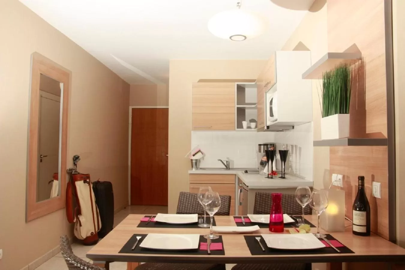 Kitchen or kitchenette in Résidence Hôtelière Natureva & Spa