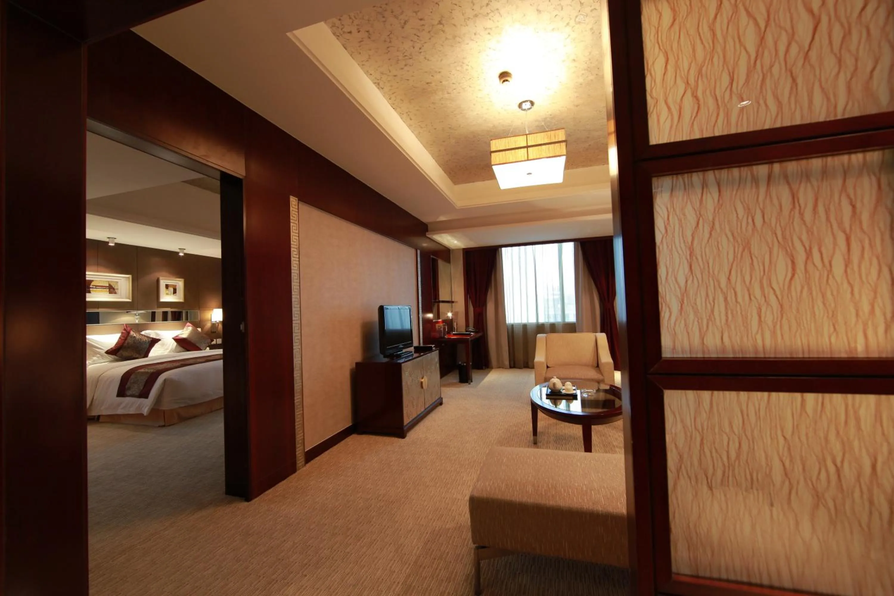 Living room, Bed in Vision Hotel