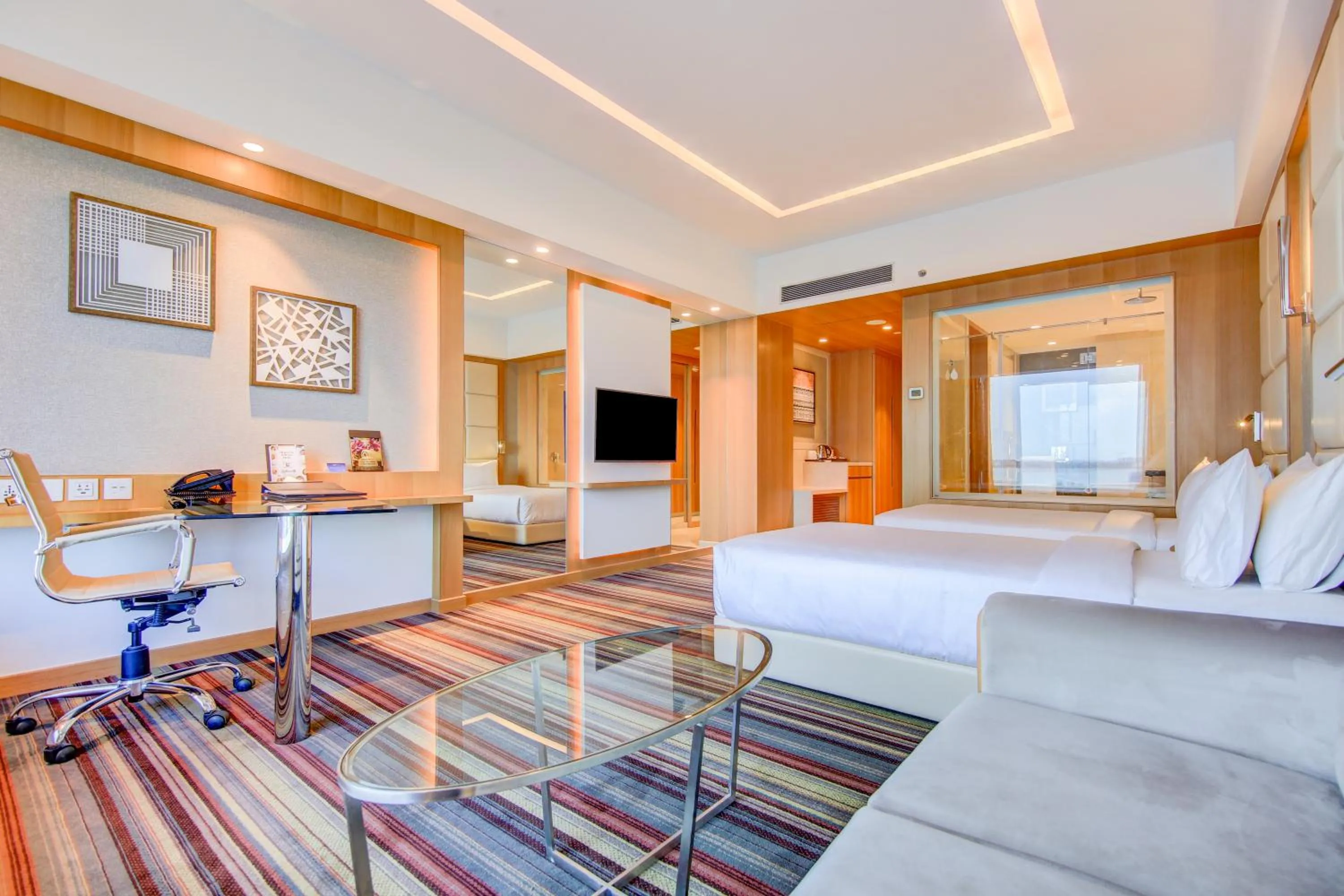 Seating area, Bed in Radisson Blu Gorakhpur