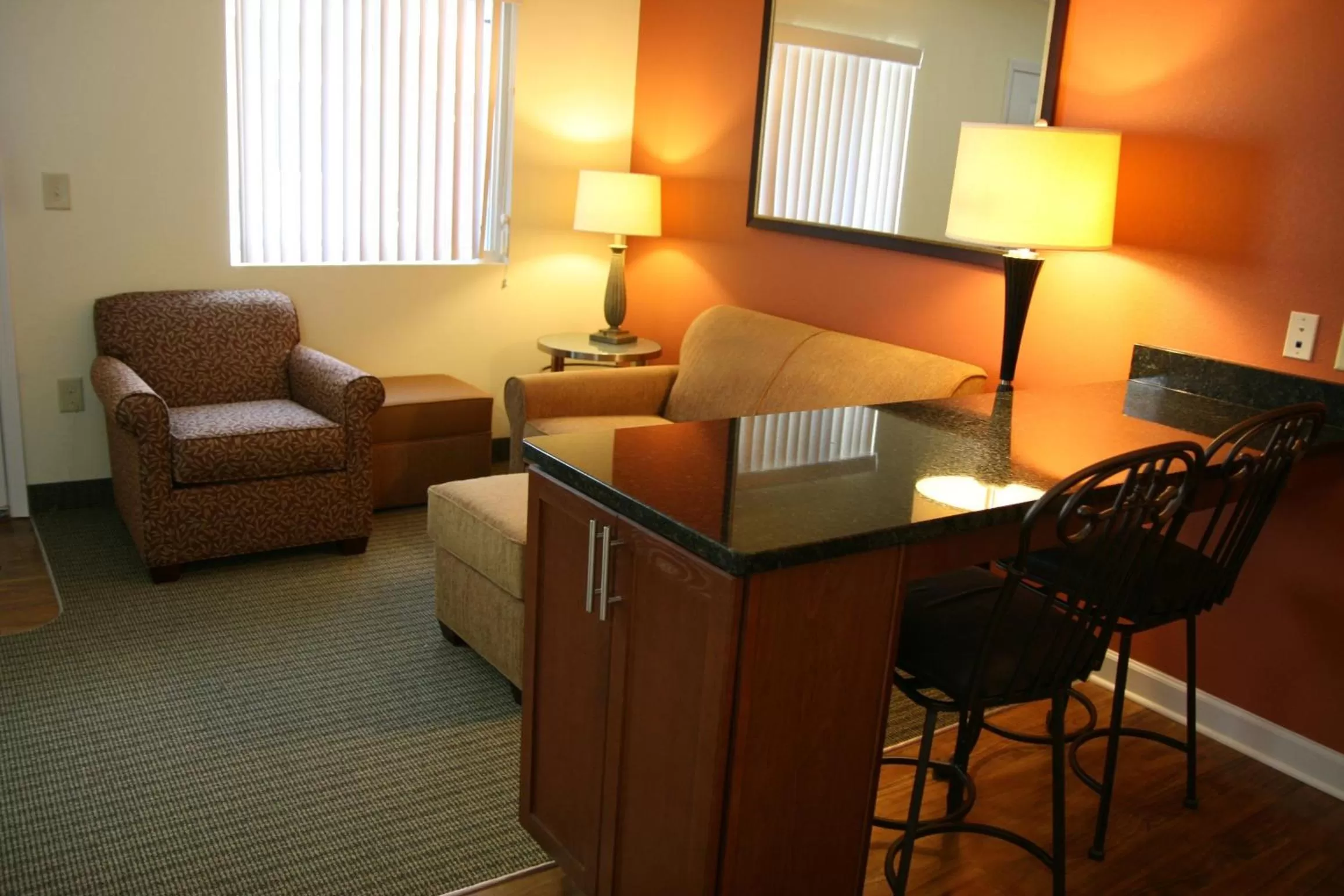 Living room in Affordable Suites - Fayetteville/Fort Bragg