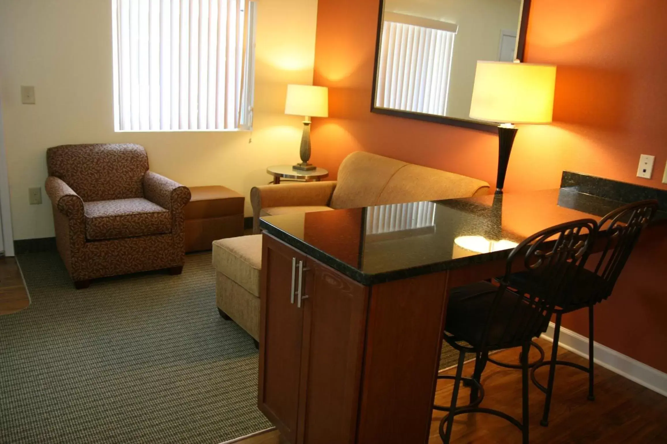 Living room, Seating Area in Affordable Suites - Fayetteville/Fort Bragg