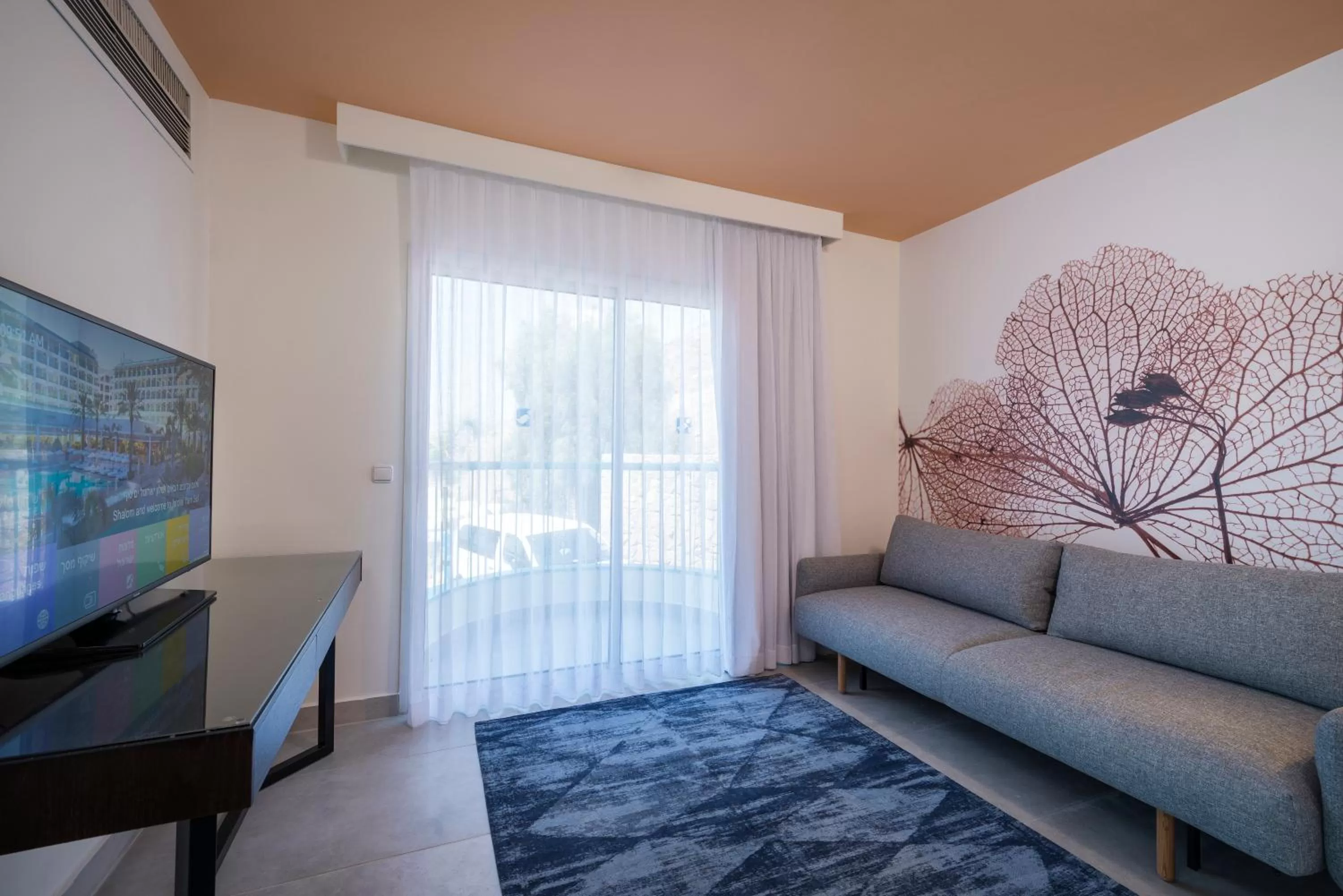 Living room in Yam Suf by Isrotel Collection