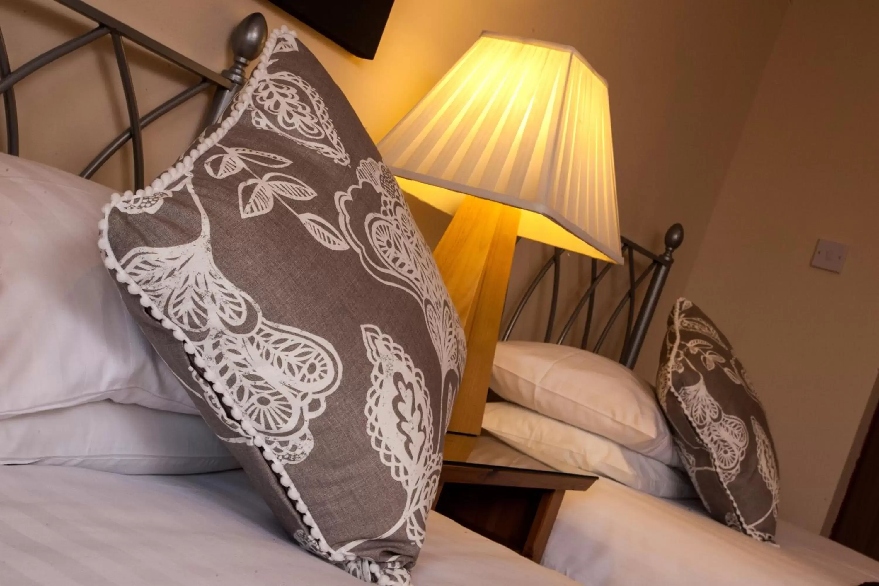 Bed, Seating Area in Dunhallin House