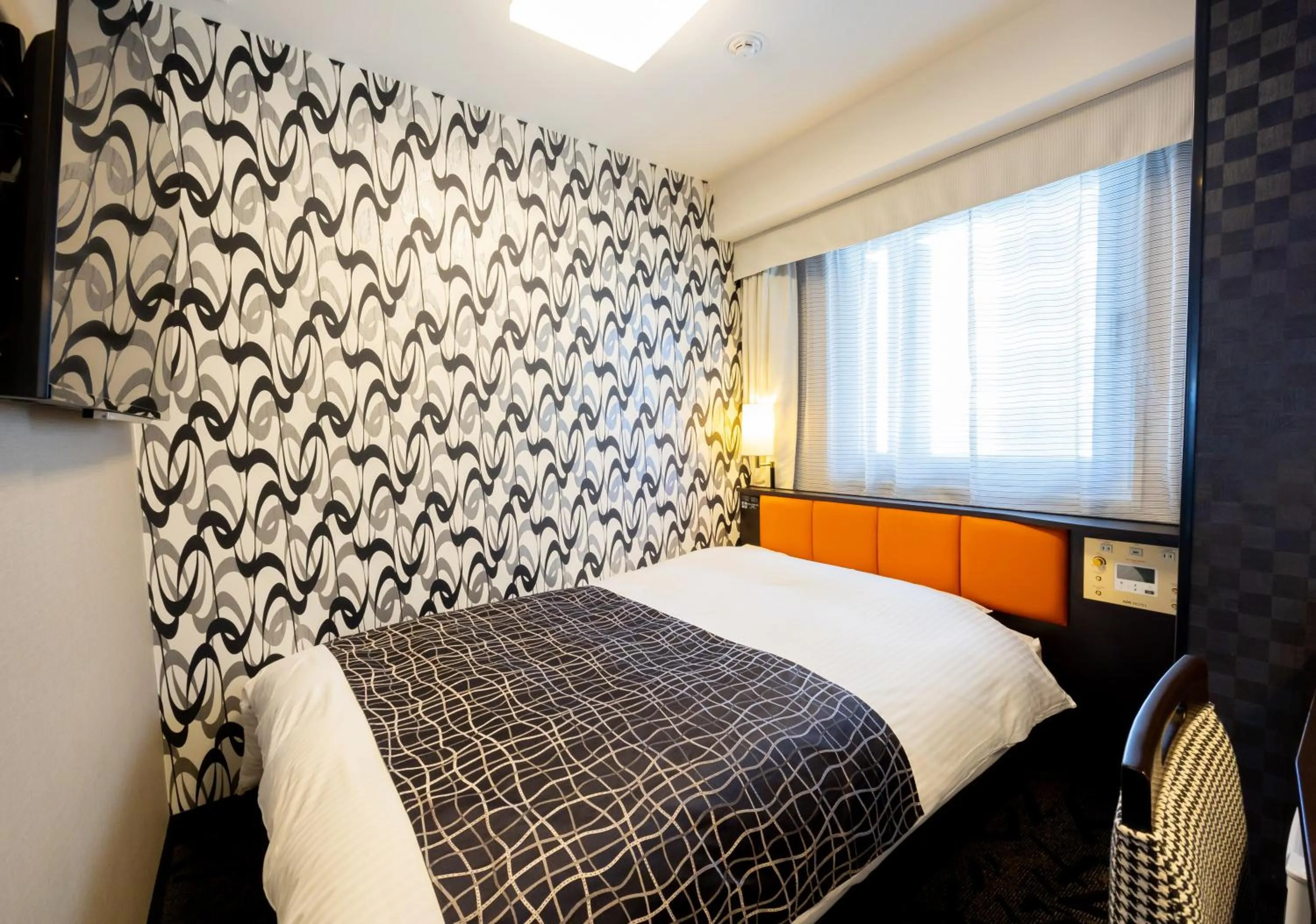 Bed in APA Hotel Osaka Umeda