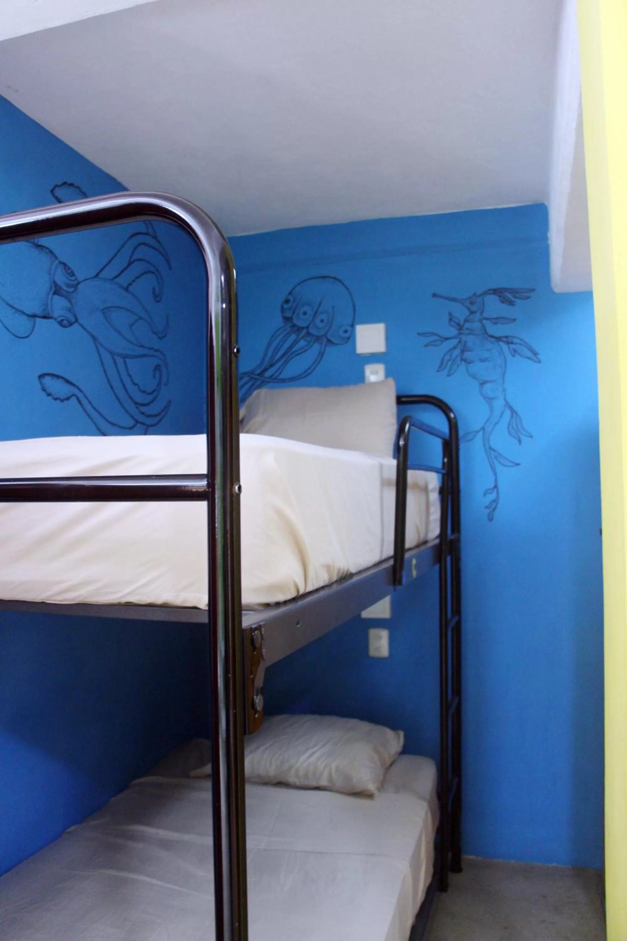 Photo of the whole room, Bunk Bed in Hotel & Hostal Casa de Luz Cancun