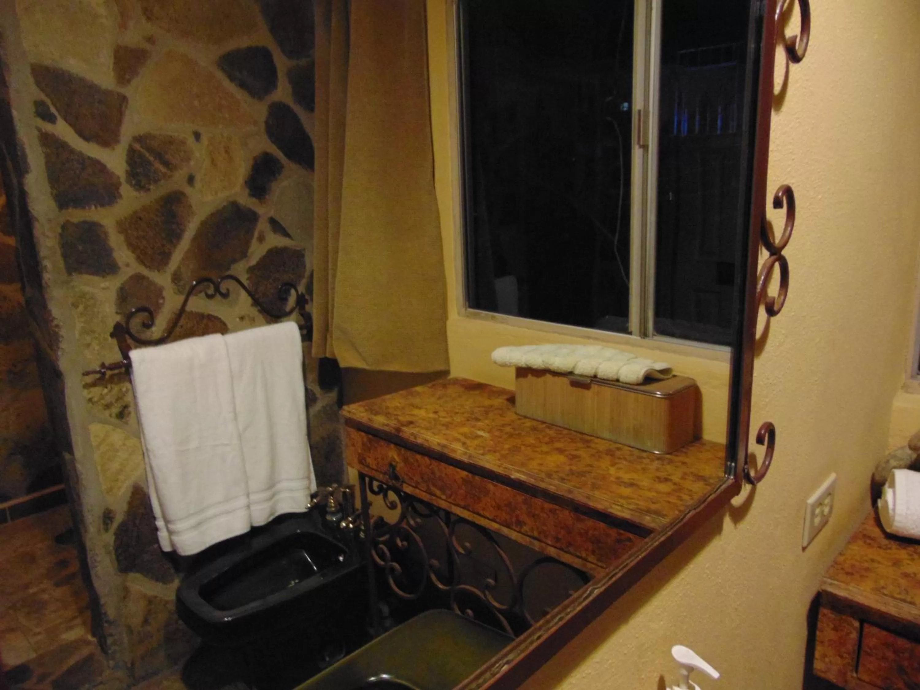 Bathroom in Poco Cielo Hotel