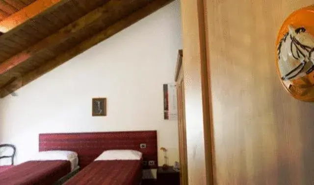 Photo of the whole room, Bed in Albergo Cavallino