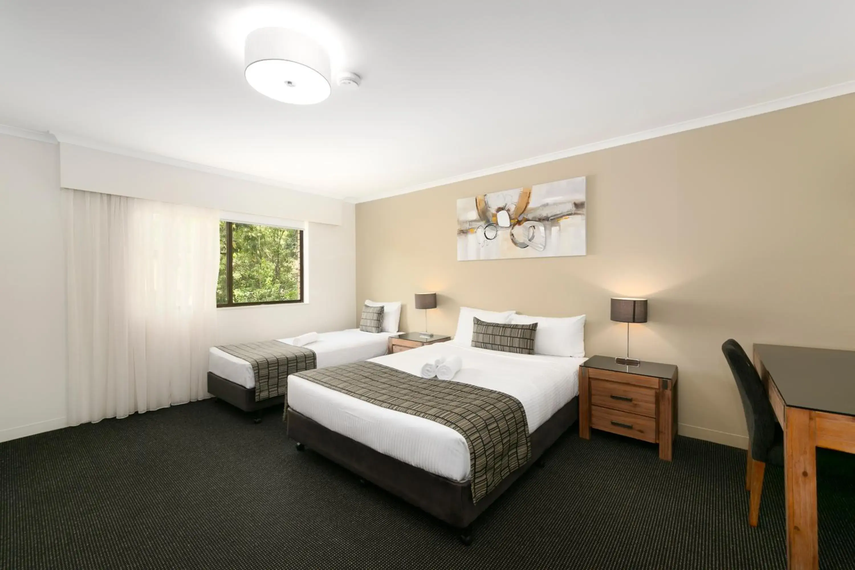 Bedroom, Bed in Mt Ommaney Hotel Apartments