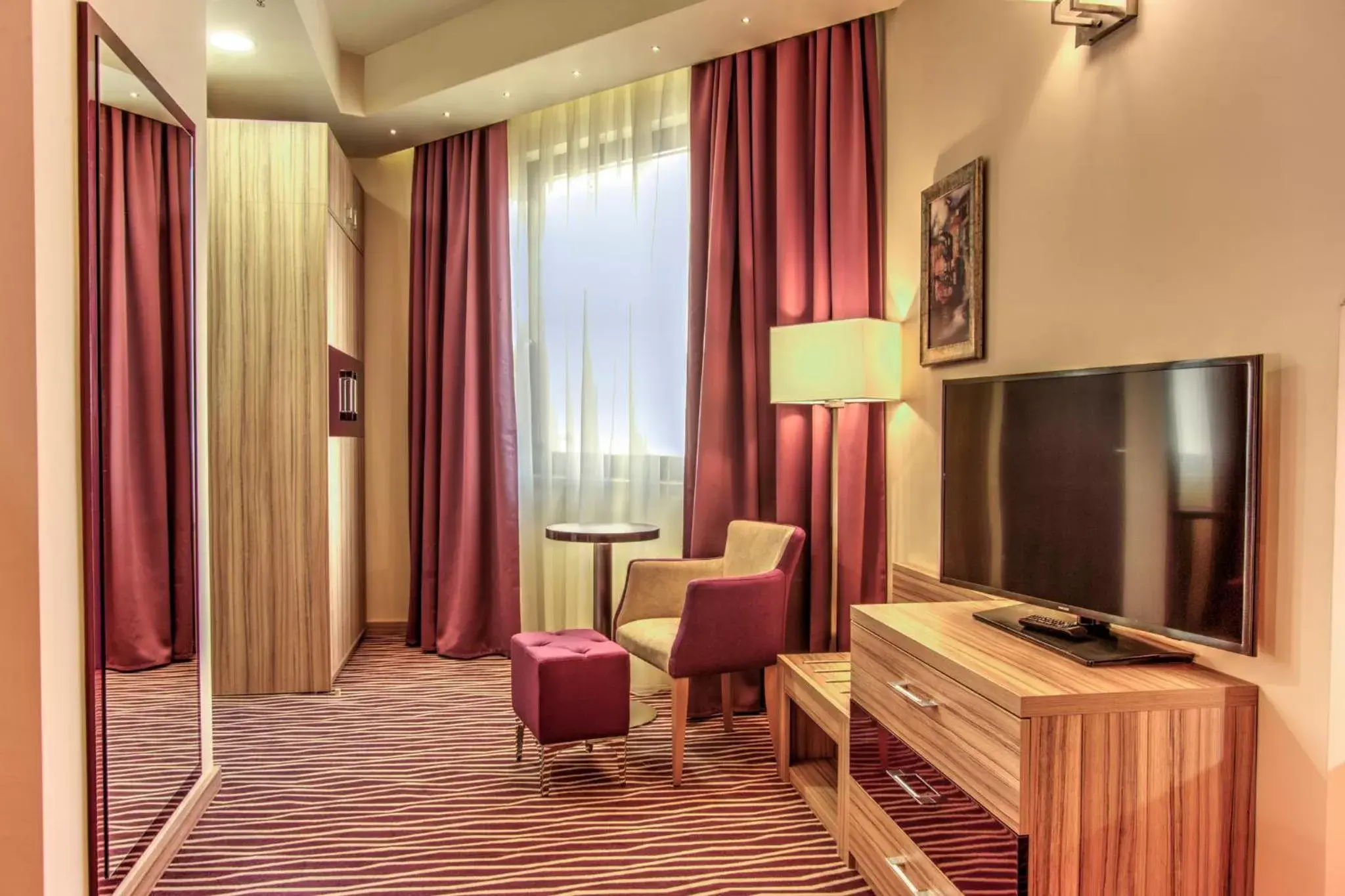 Photo of the whole room, TV/Entertainment Center in Holiday Inn Plovdiv, an IHG Hotel