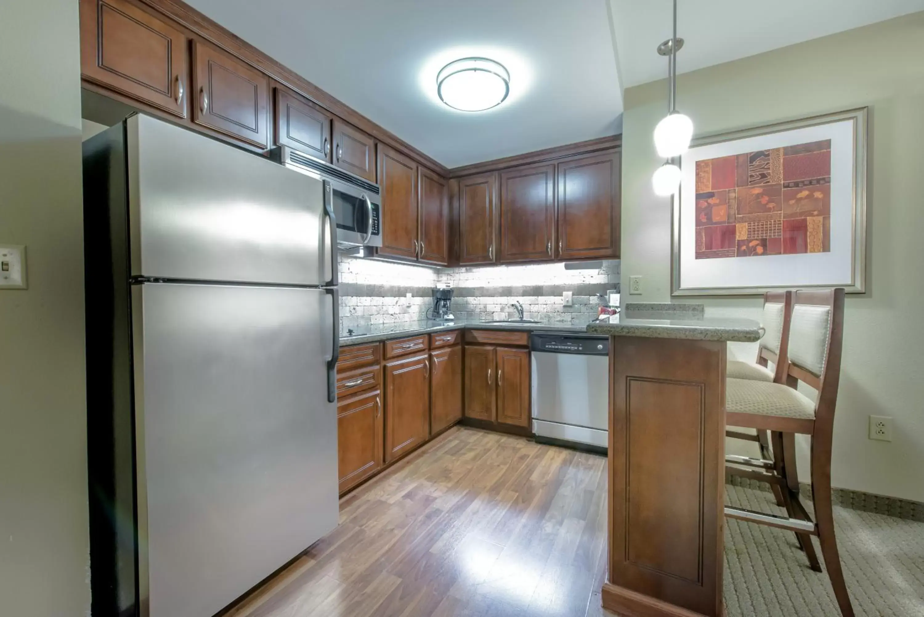 Photo of the whole room, Kitchen/Kitchenette in Staybridge Suites Wilmington East, an IHG Hotel