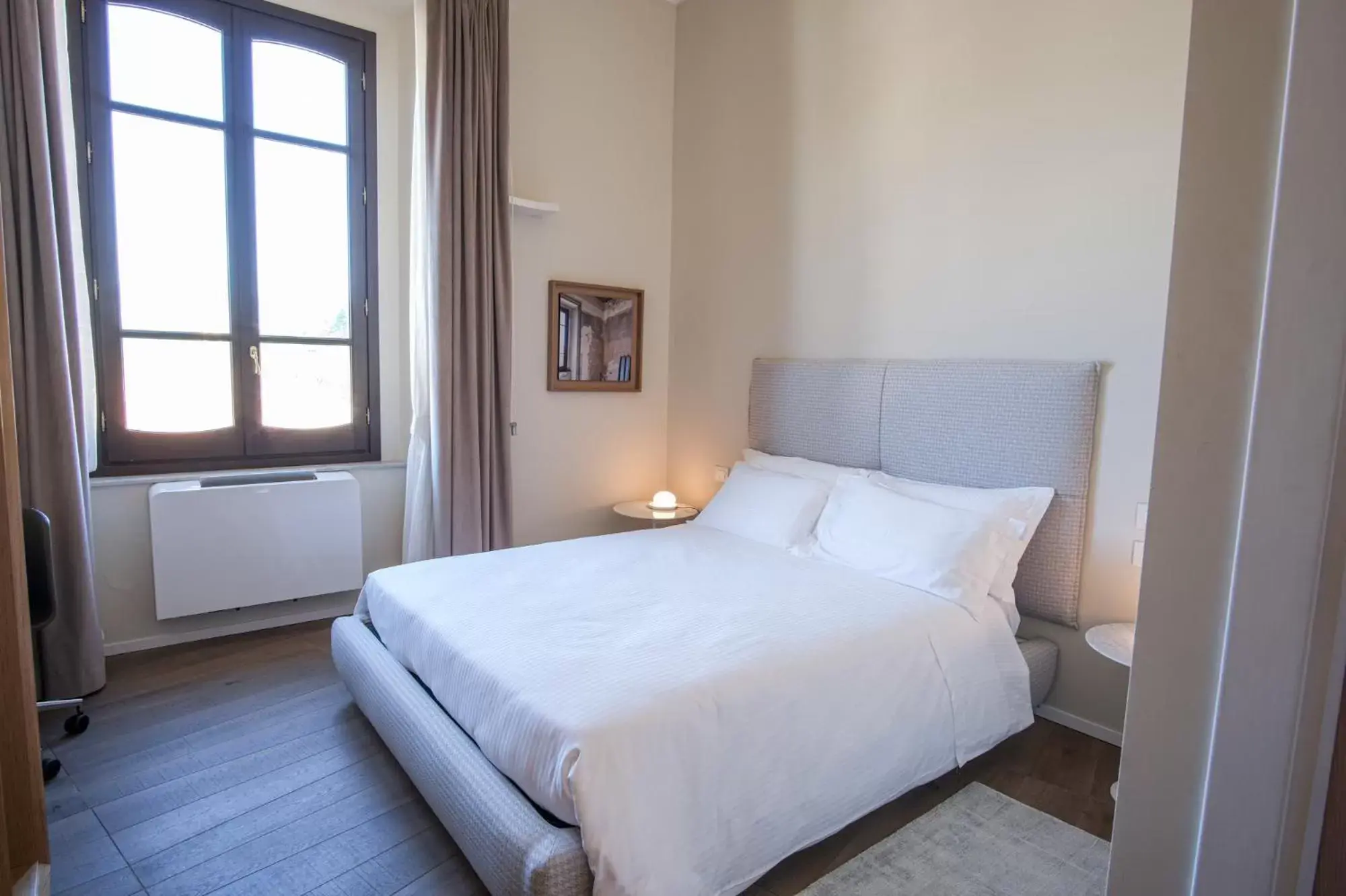 Bed in Dimora de Matera Luxury Suites