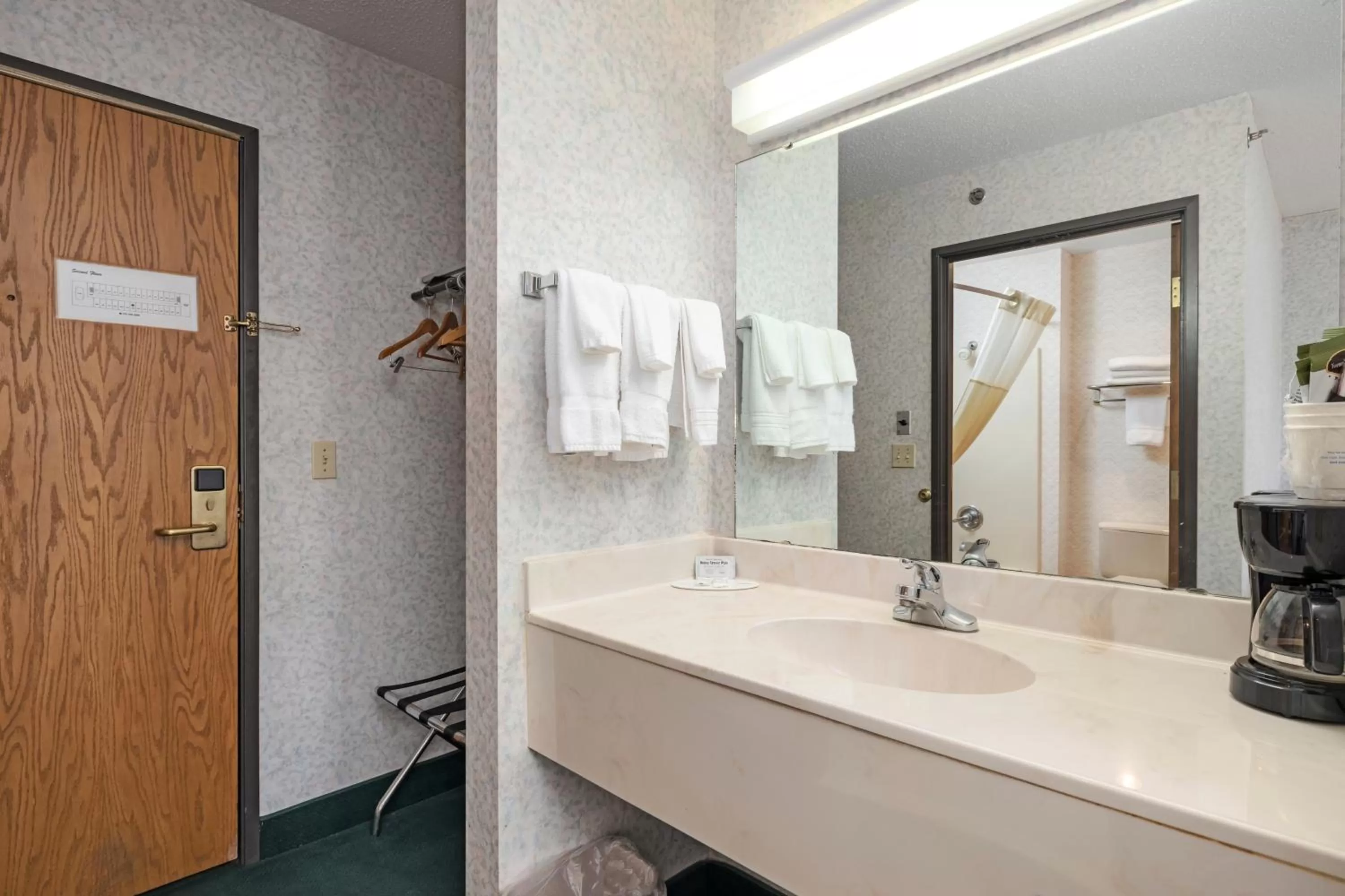 Bathroom in Days Inn by Wyndham Battlefield Rd/Hwy 65