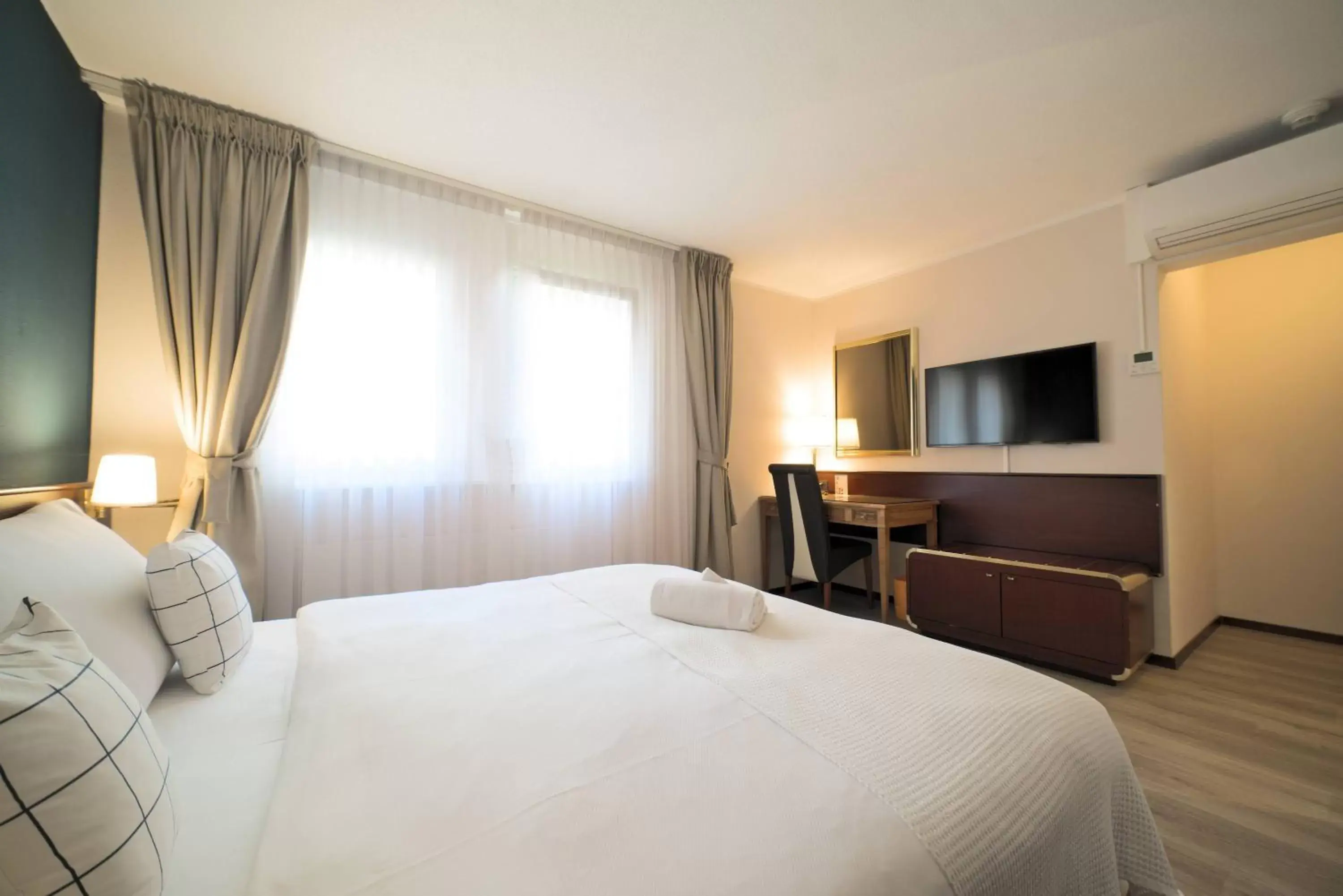 Bed in Tulip Inn Beaulieu Lausanne Bed in Tulip Inn Beaulieu Lausanne