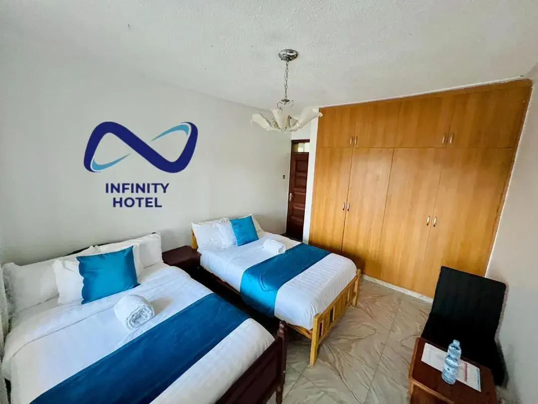 Bed in Infinity Hotel Kampala