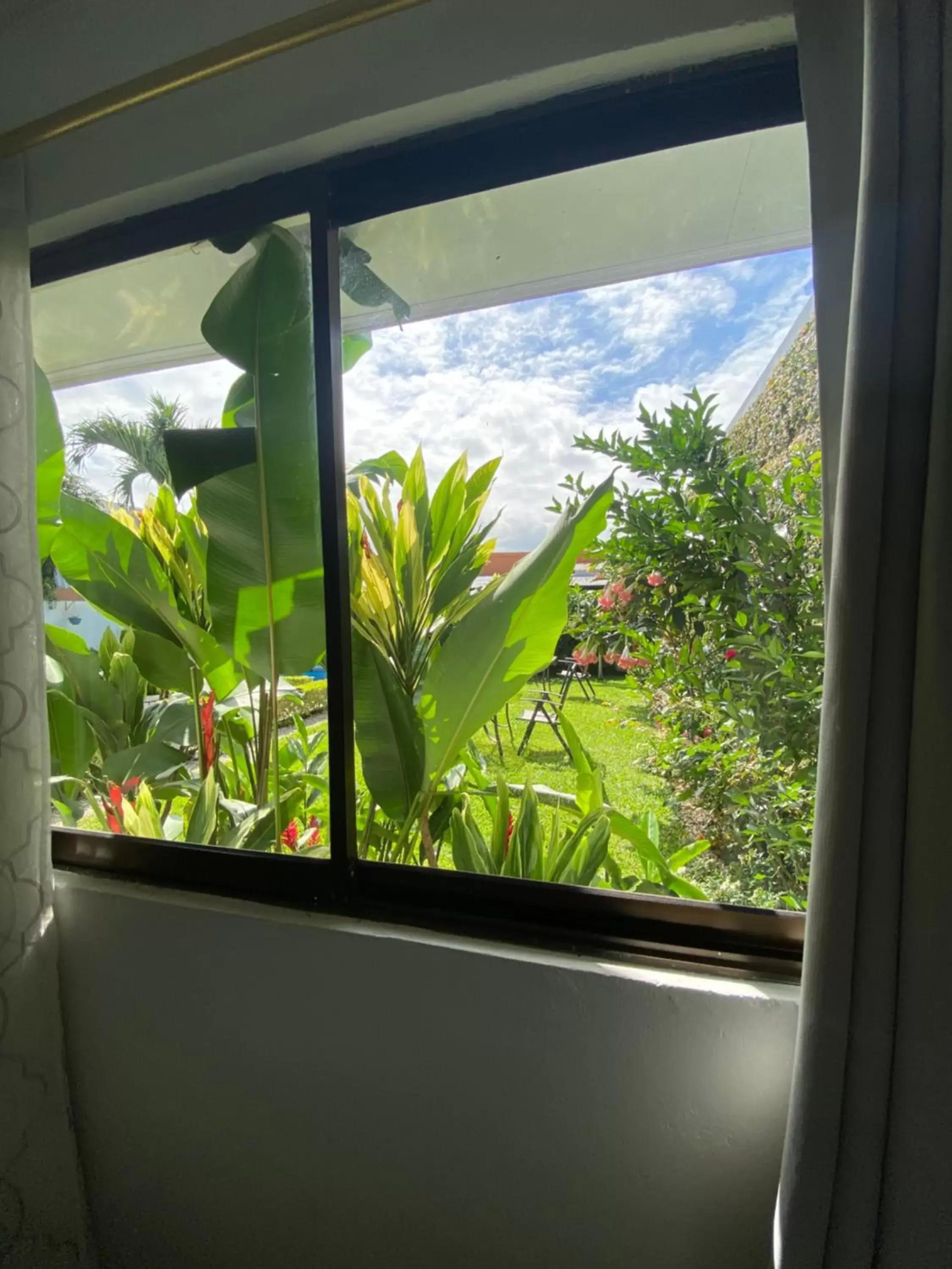 Garden view, Mountain View in Berlor Airport Inn