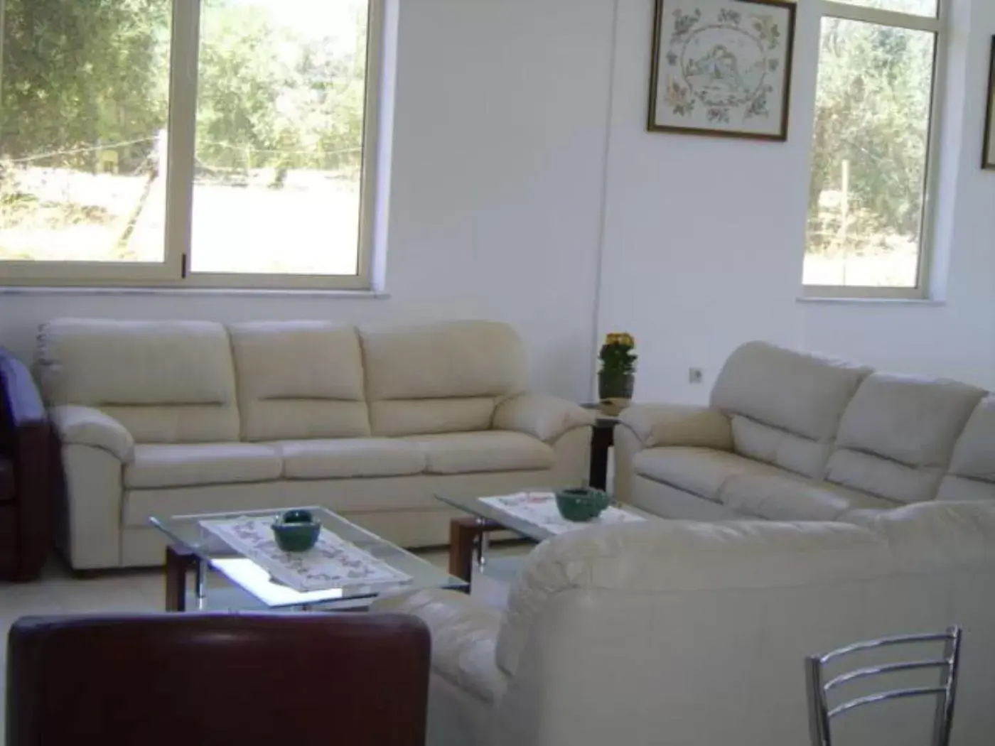 Communal lounge/ TV room, Seating Area in Hotel Kourkoumelata