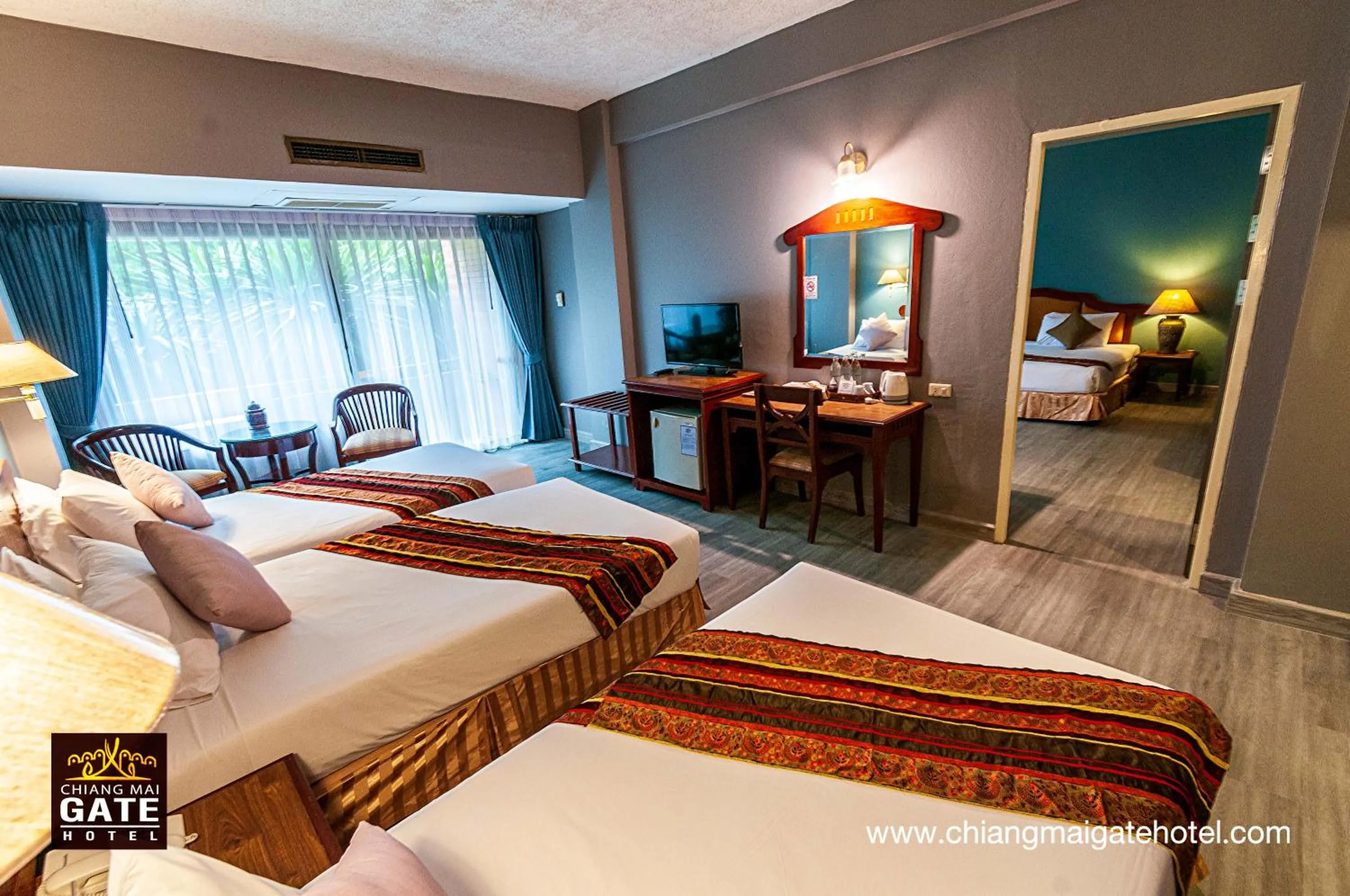 Bed in Chiangmai Gate Hotel