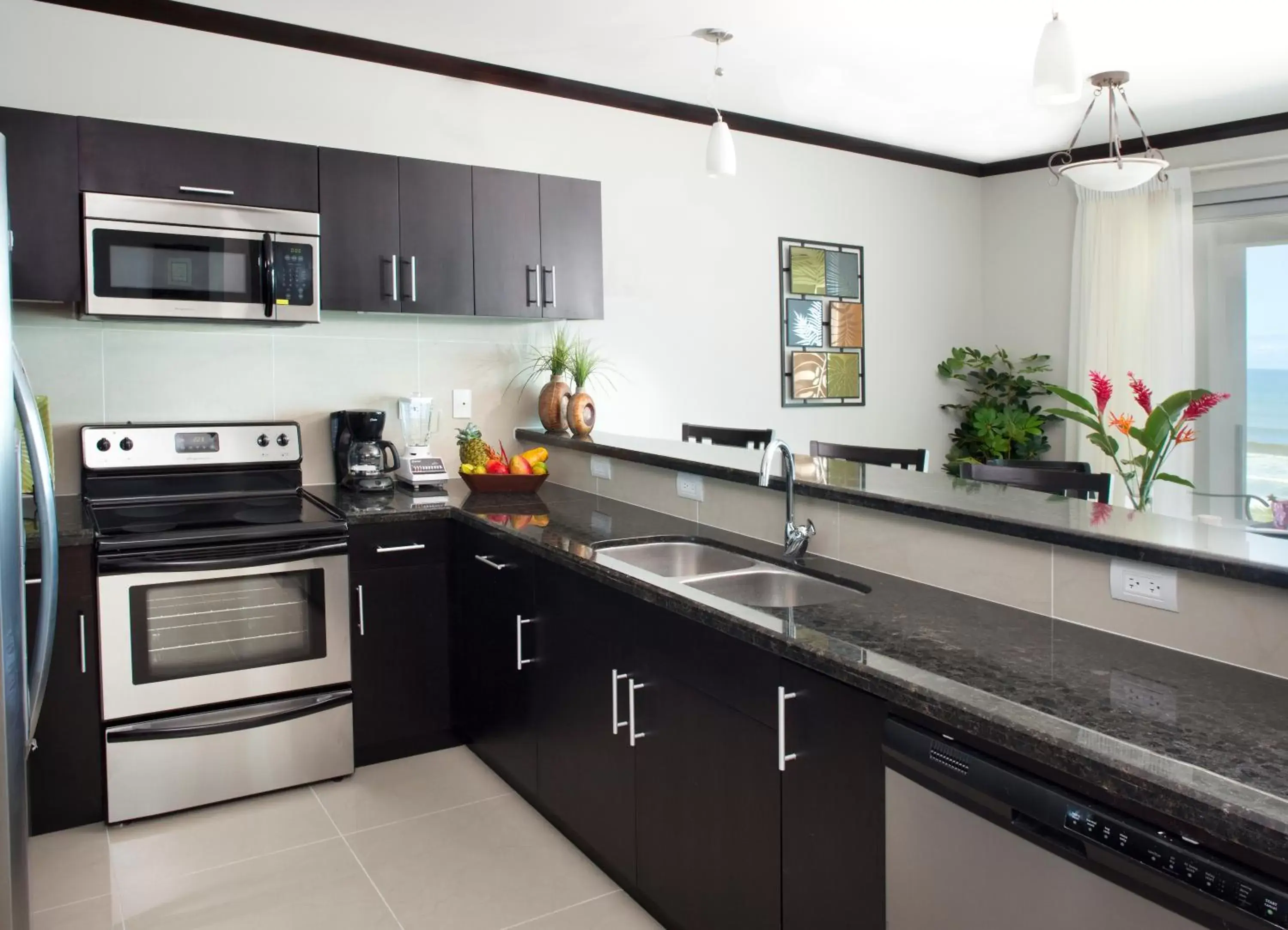 Kitchen/Kitchenette in Best in Jaco Condos at Diamante del Sol