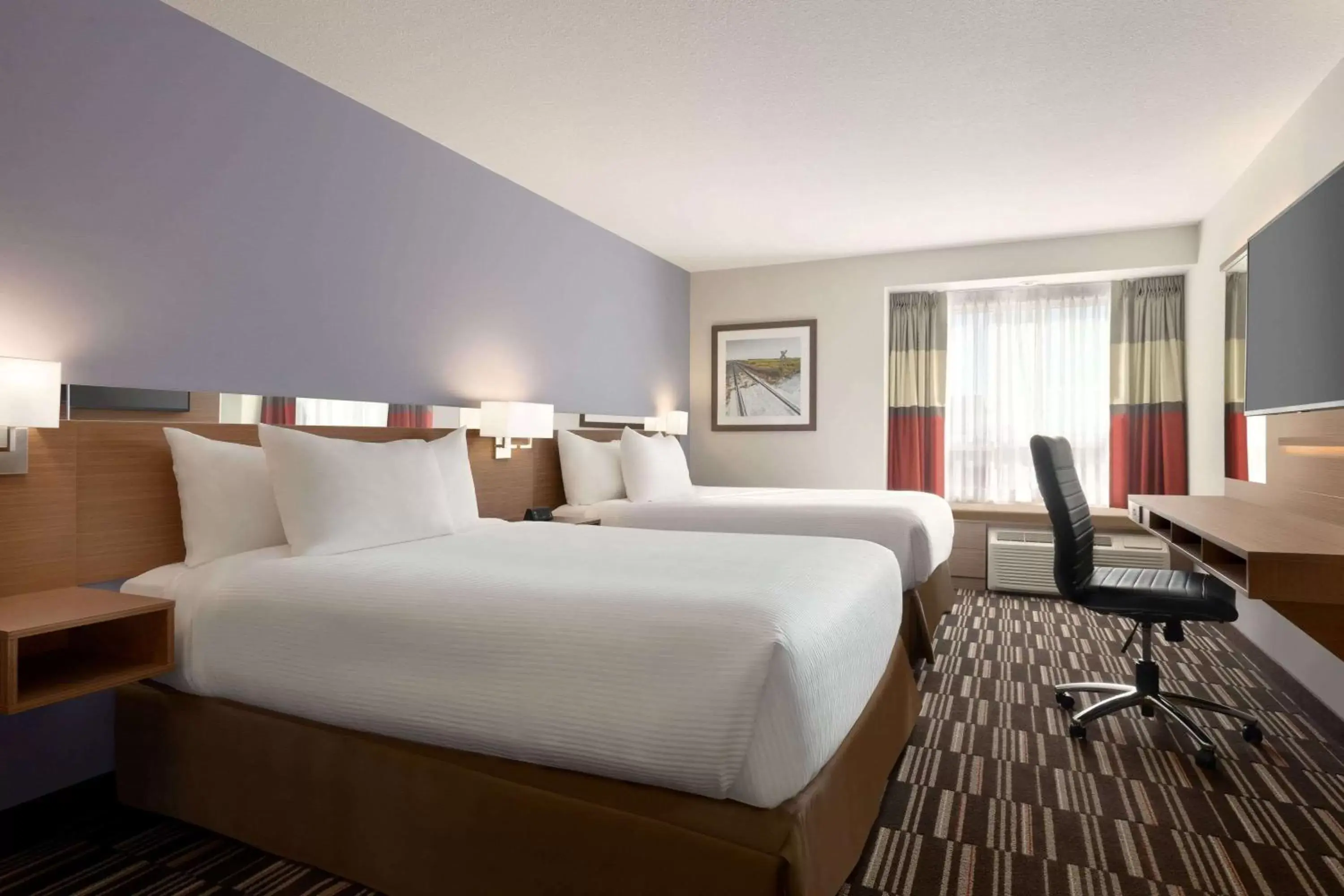 Photo of the whole room, Bed in Microtel Inn & Suites by Wyndham Bonnyville