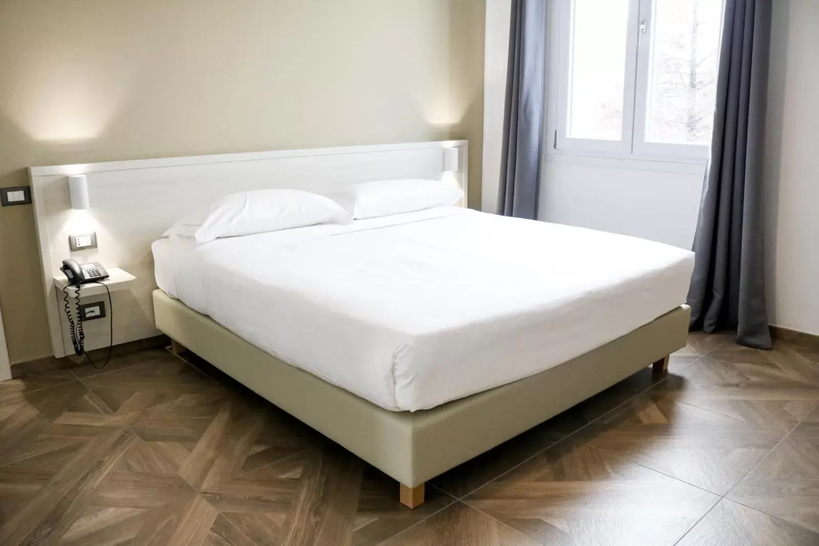 Bed in Hotel Donatello