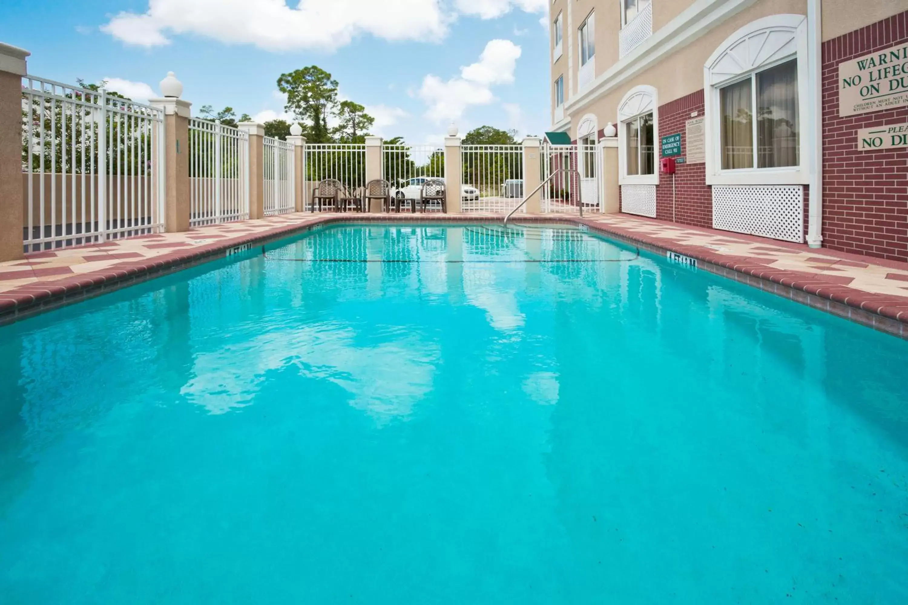 Swimming pool in Country Inn & Suites by Radisson, St Petersburg - Clearwater, FL Swimming pool in Country Inn & Suites by Radisson, St Petersburg - Clearwater, FL