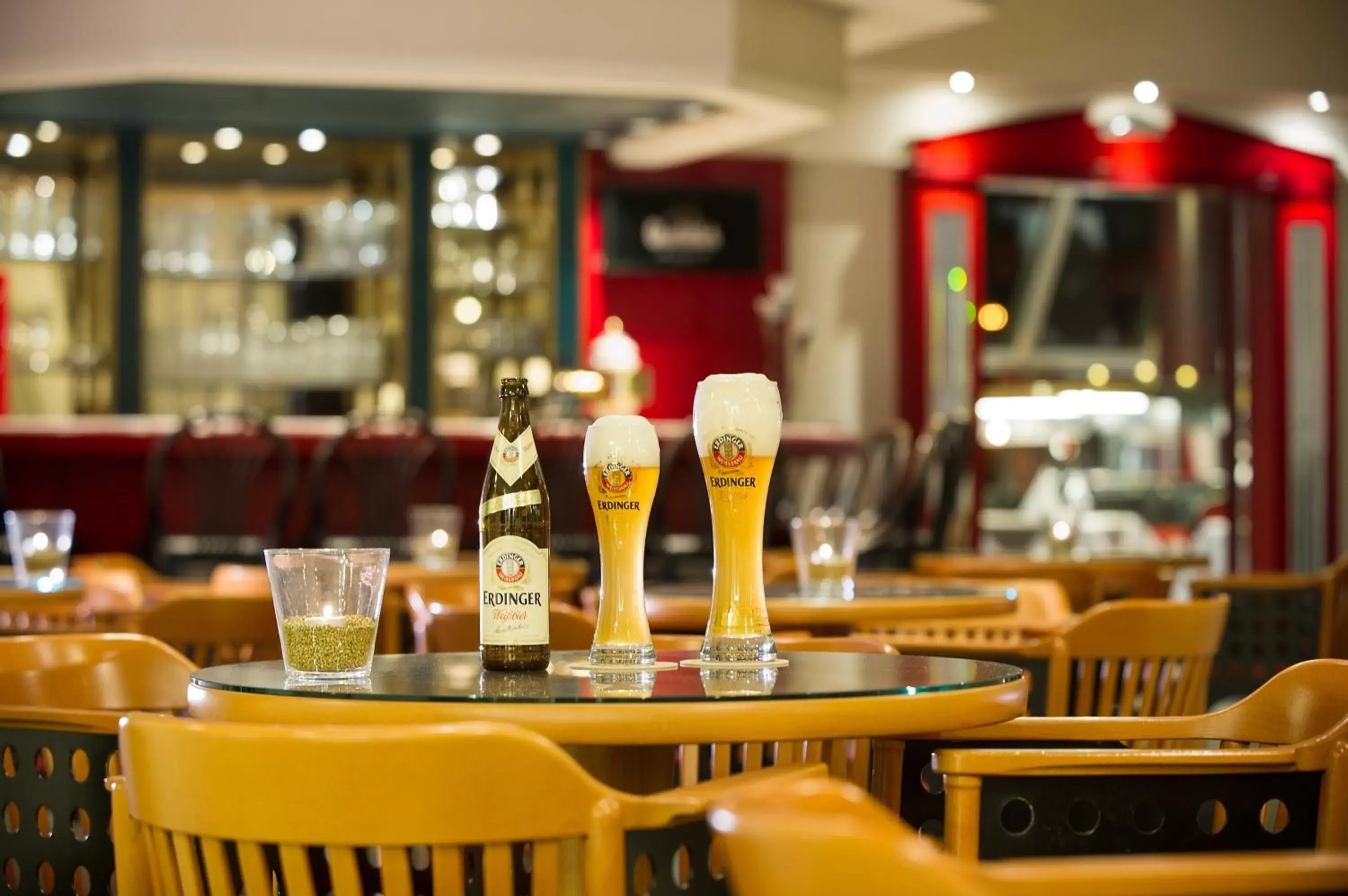 Lounge or bar in Michel Hotel Landshut Kaiserhof an der Isar Lounge or bar in Michel Hotel Landshut Kaiserhof an der Isar