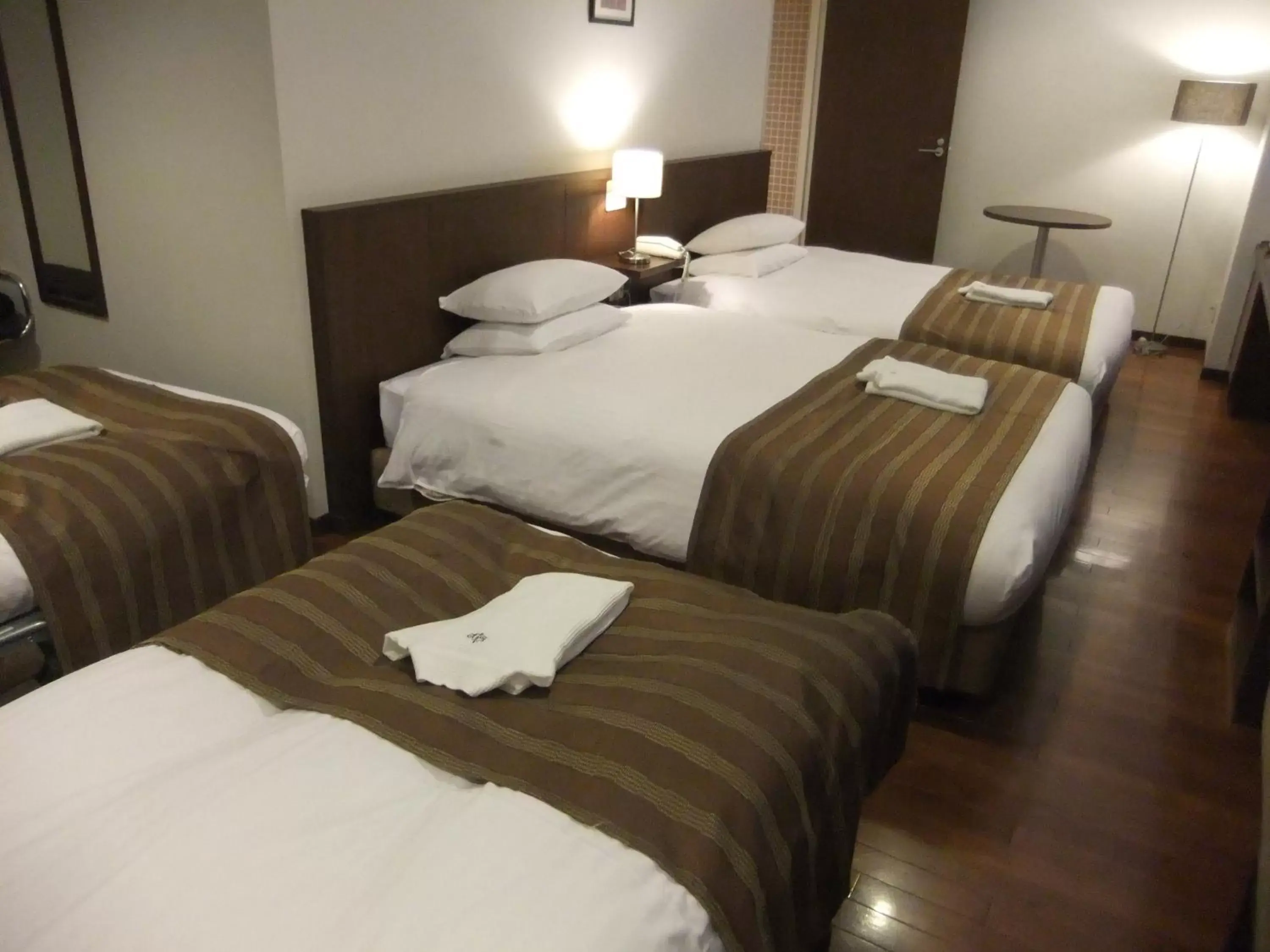 Bed in Sutton Hotel Hakata City