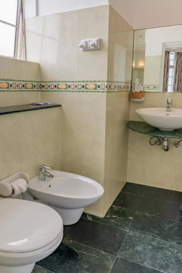 Bathroom in Global Towers Hotel & Apartments