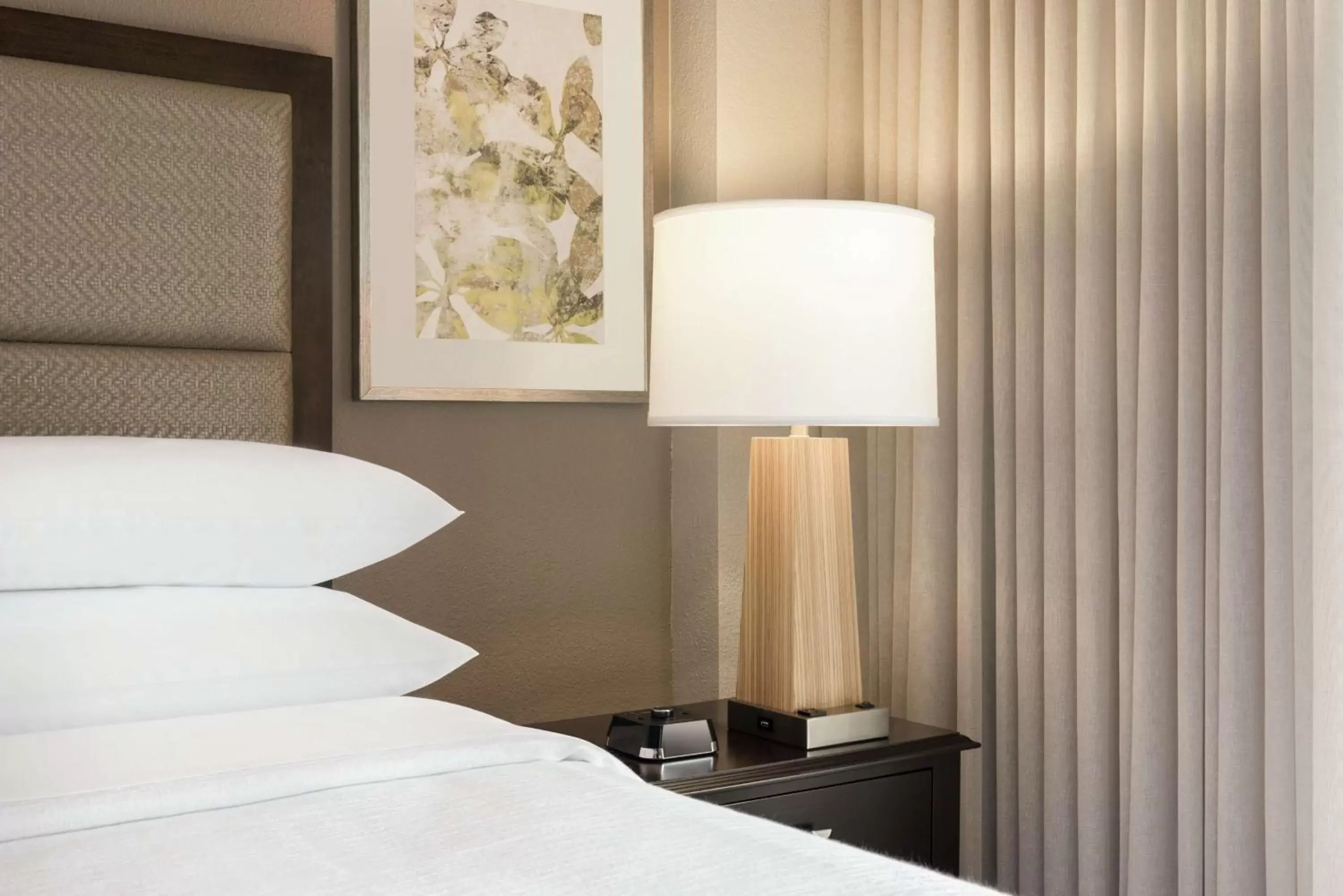 Bed in Embassy Suites by Hilton Atlanta Alpharetta