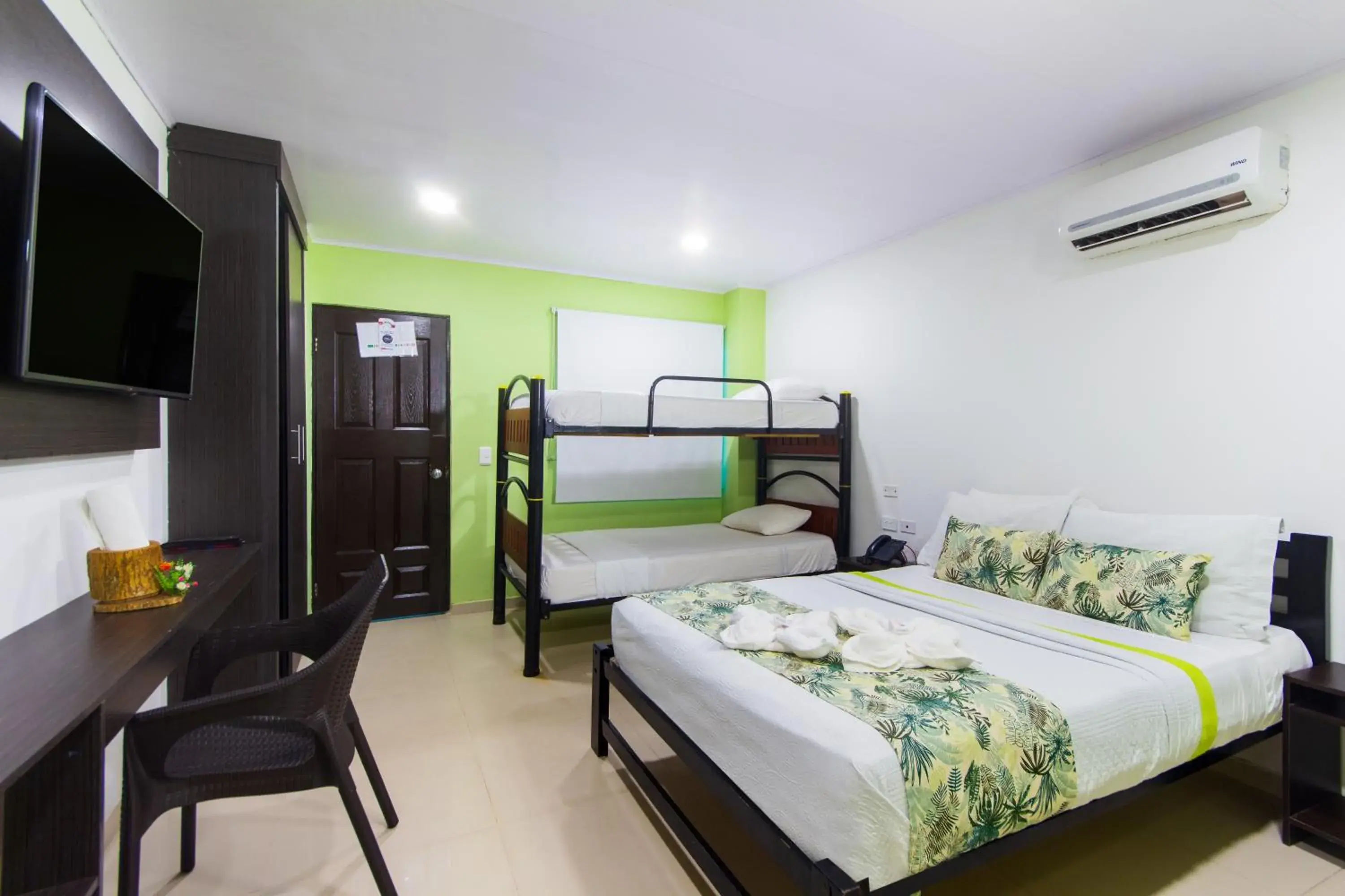 Bed in Hotel Marina Suites By GEH Suites