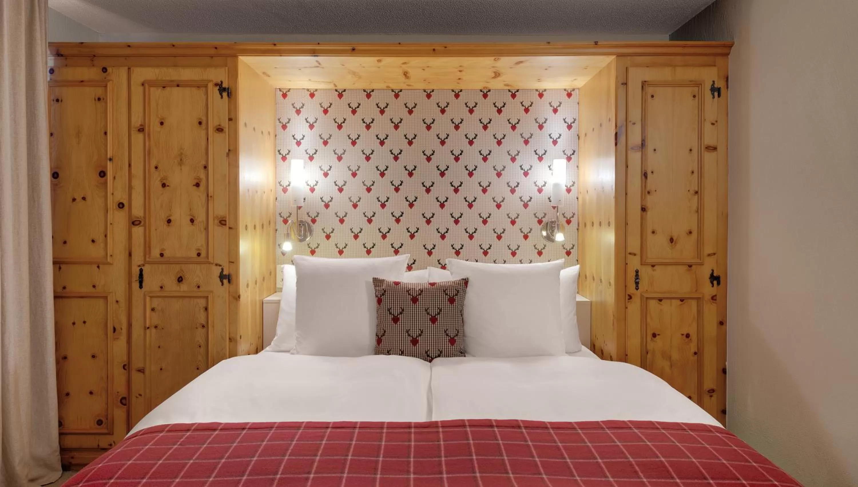 Decorative detail, Bed in Morosani Posthotel