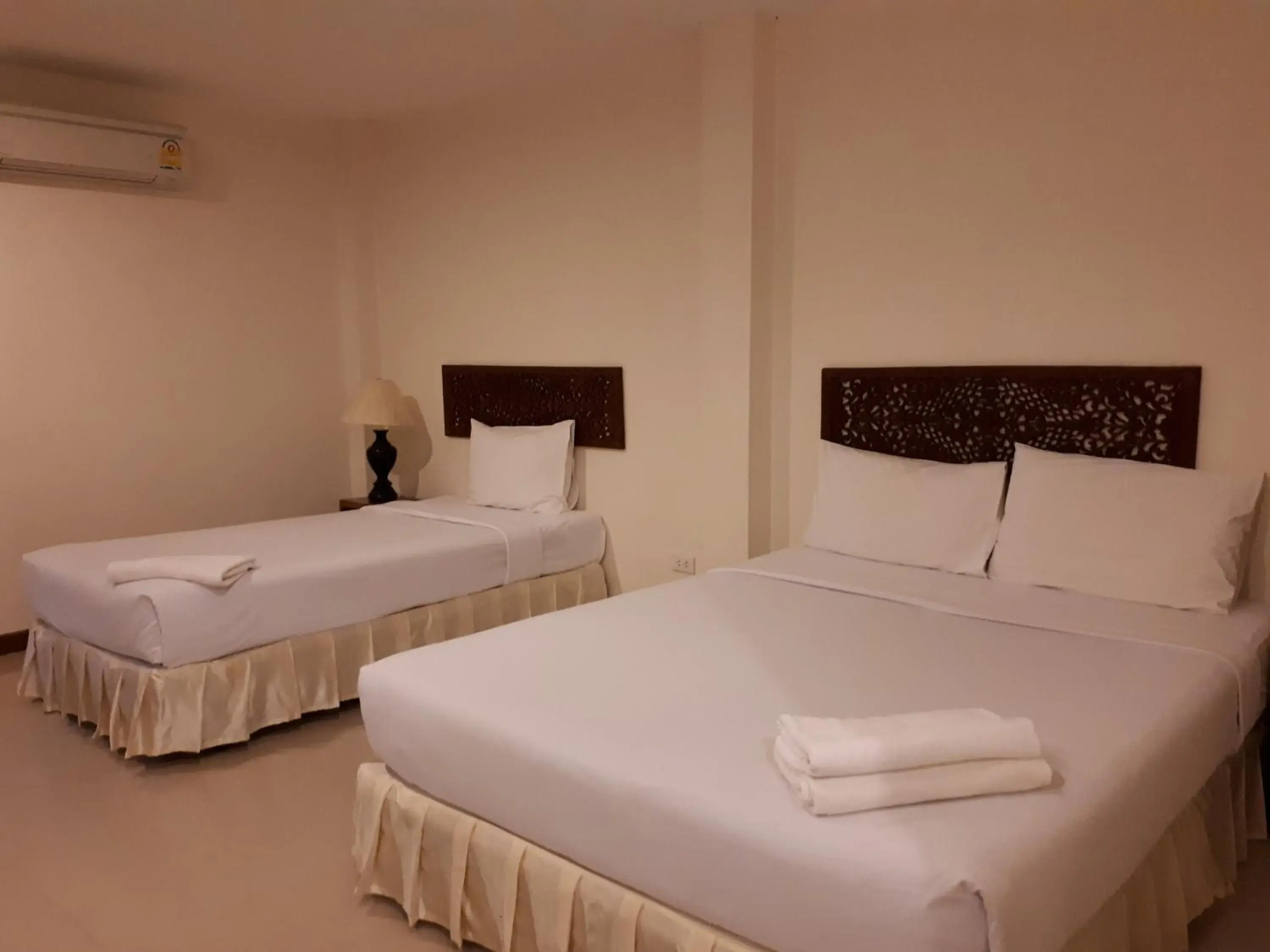 Bed in Nathon Residence Hotel