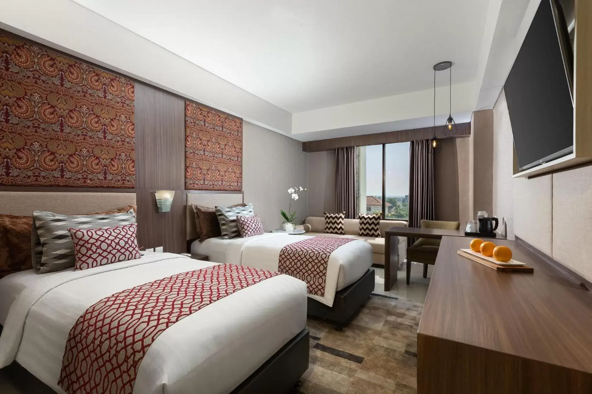 Bed in The Alana Hotel & Conference Center Malioboro Yogyakarta by ASTON