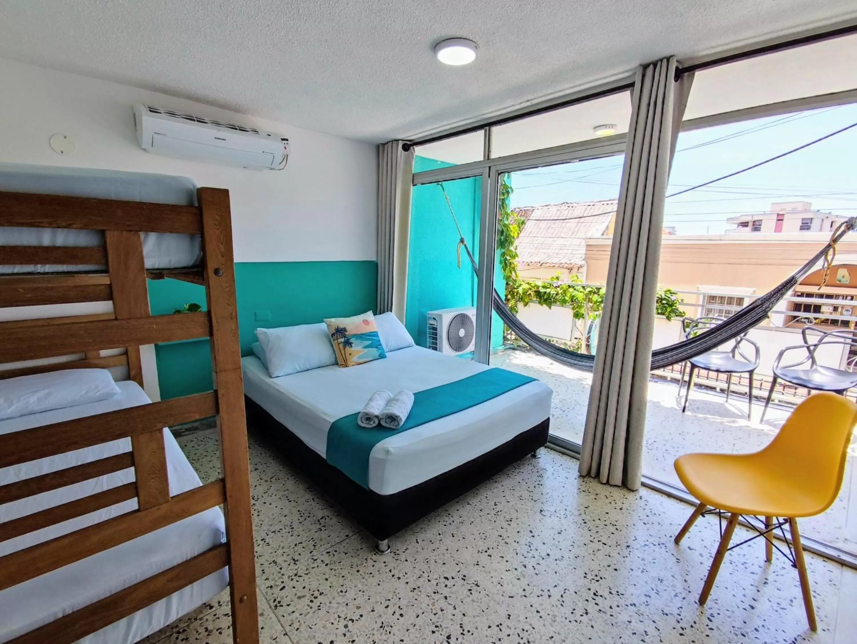 Bed in Bona Vida Hotel