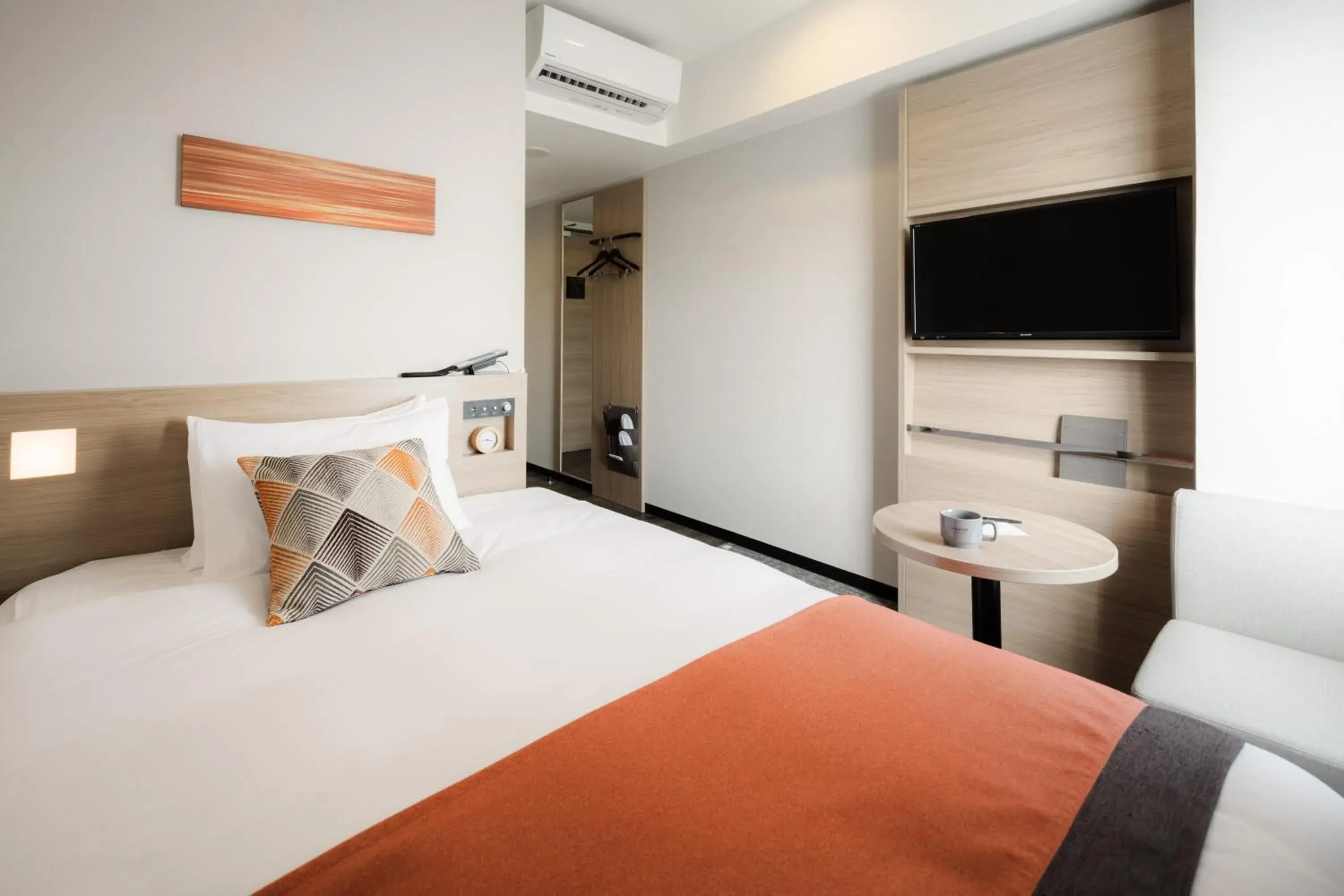 Bed in Tissage Hotel Naha by Nest Bed in Tissage Hotel Naha by Nest