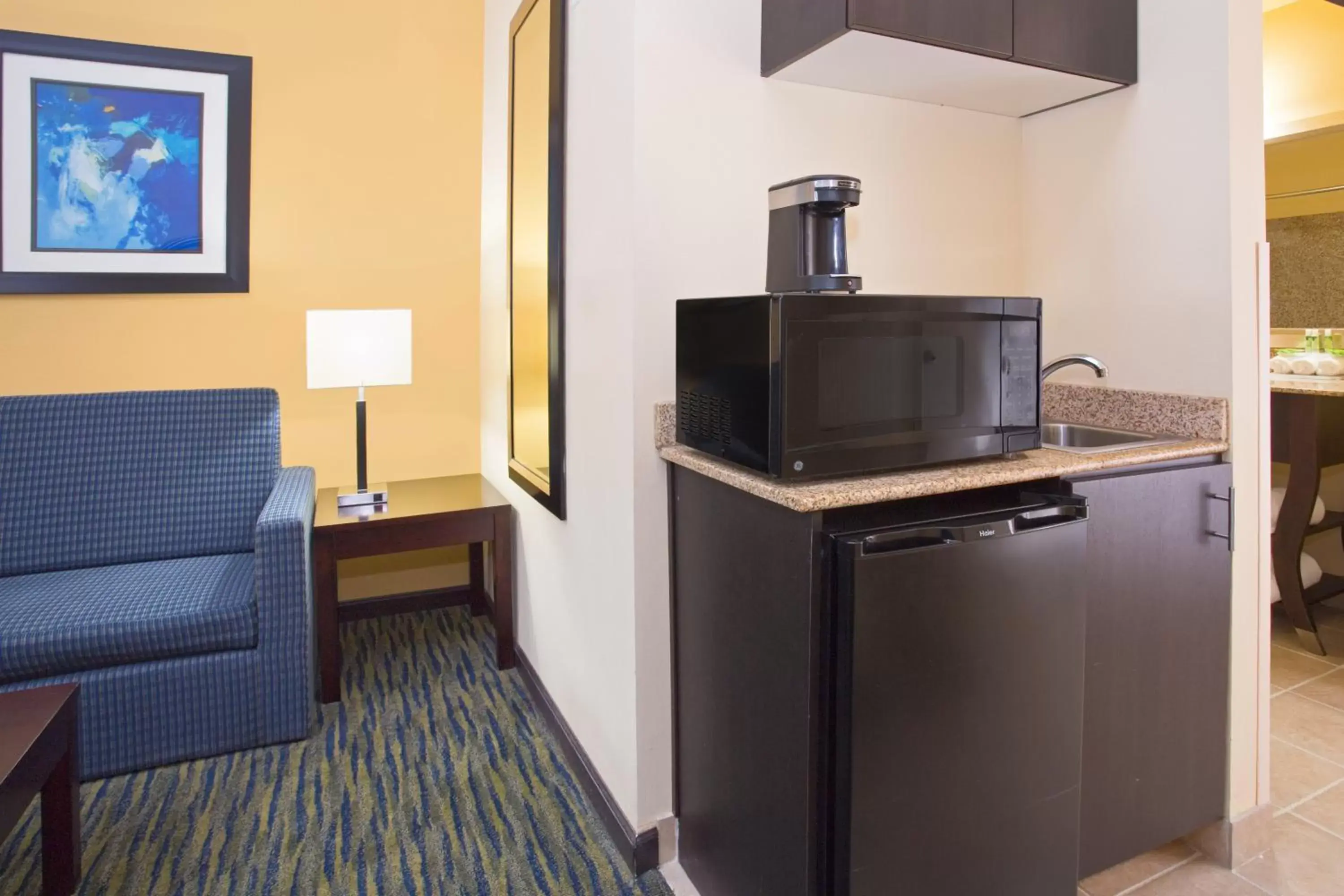 Photo of the whole room, TV/Entertainment Center in Holiday Inn Express & Suites Denver North - Thornton, an IHG Hotel