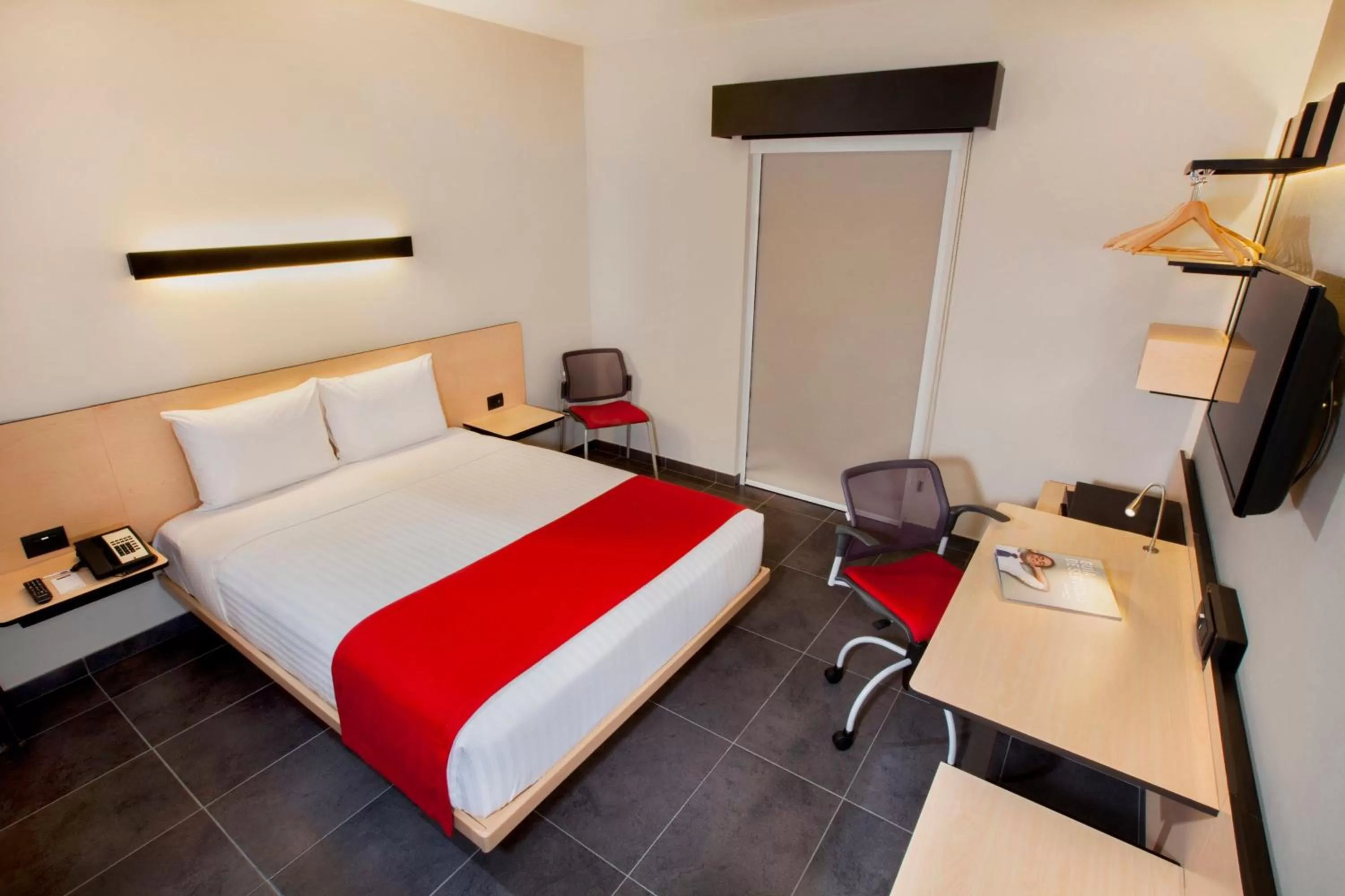 Photo of the whole room in City Express Plus by Marriott Cabo San Lucas