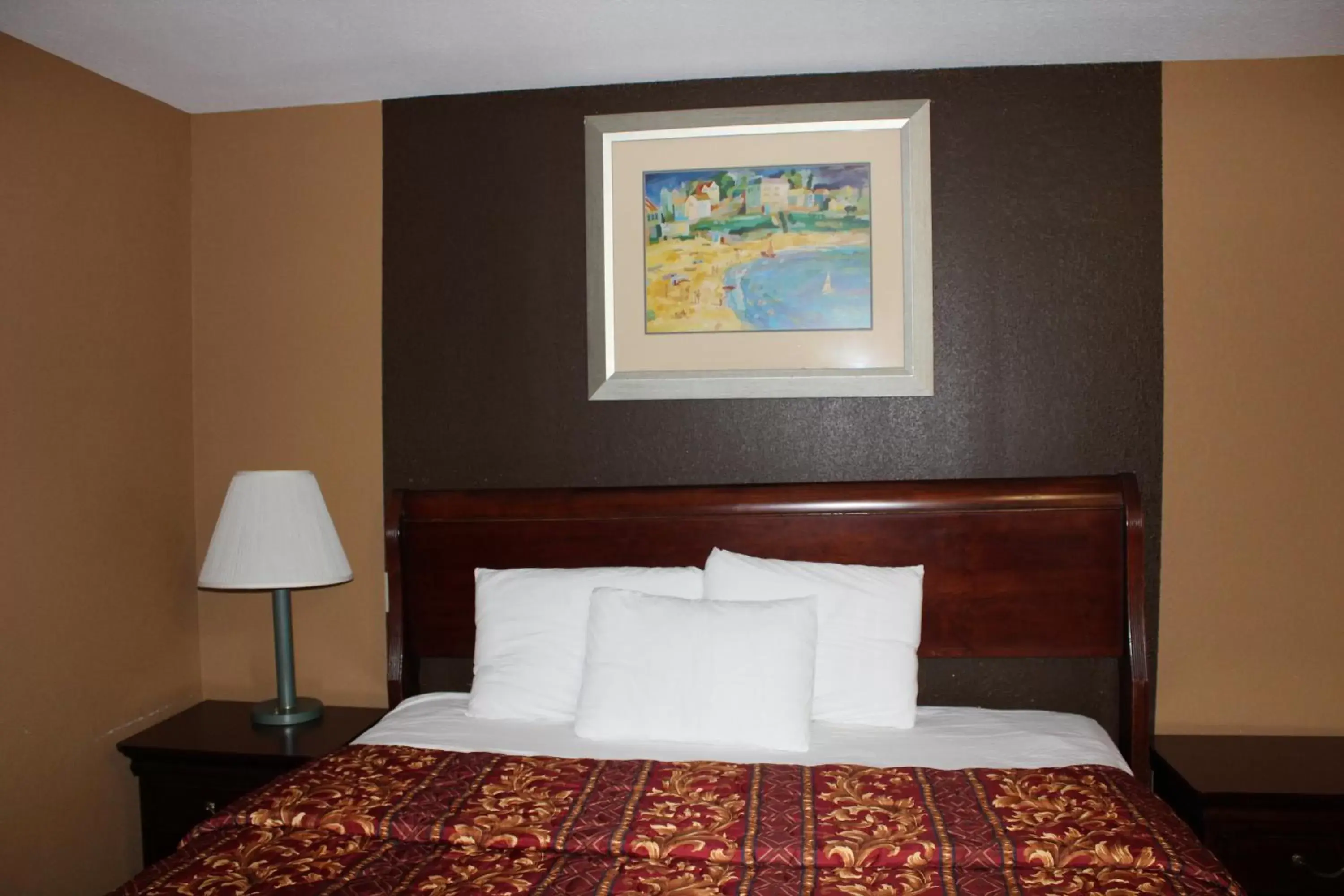 Bedroom, Bed in Coratel Inn and Suites Maple Grove