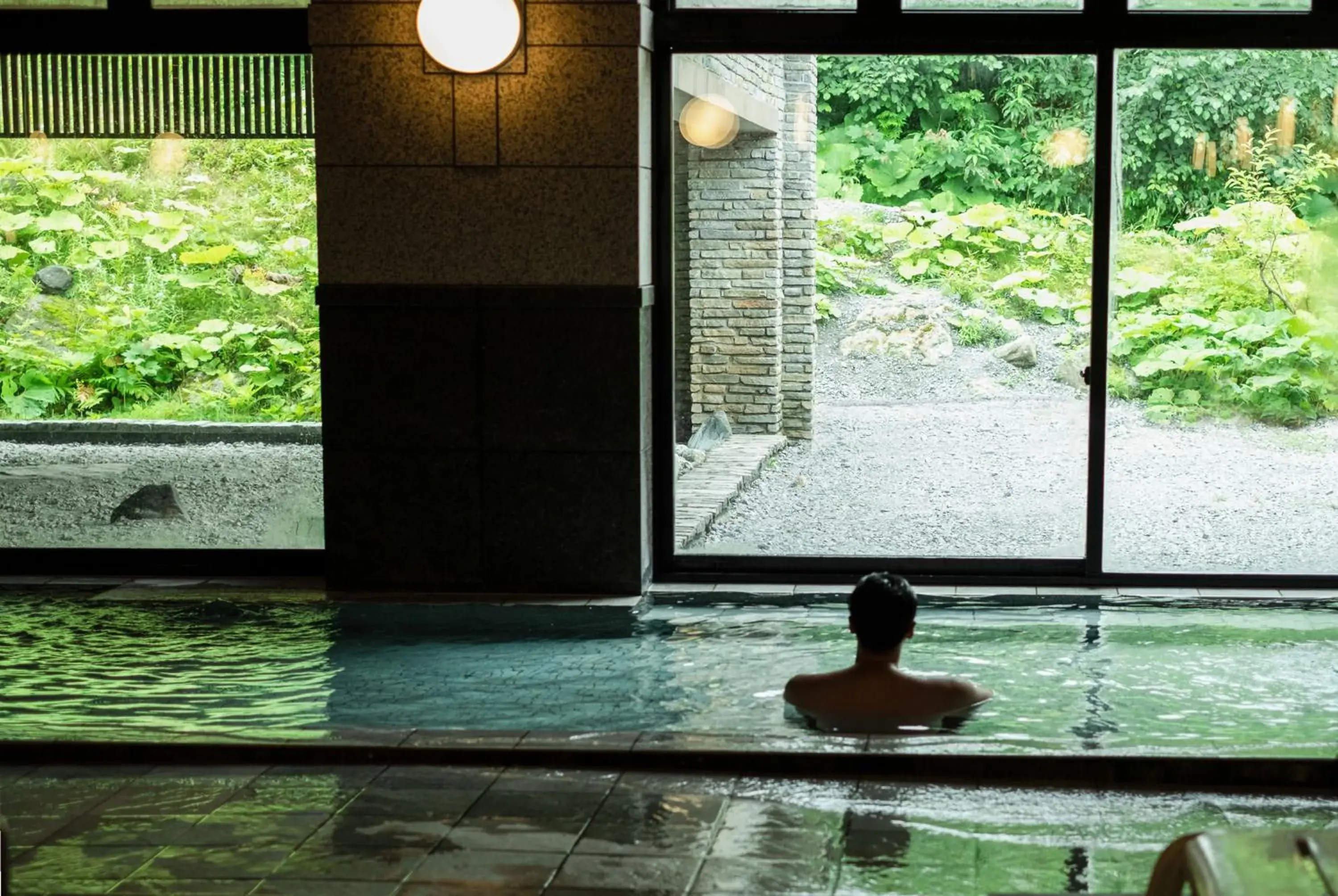 Hot Spring Bath, Swimming Pool in Asahidake Onsen Hotel Bear Monte